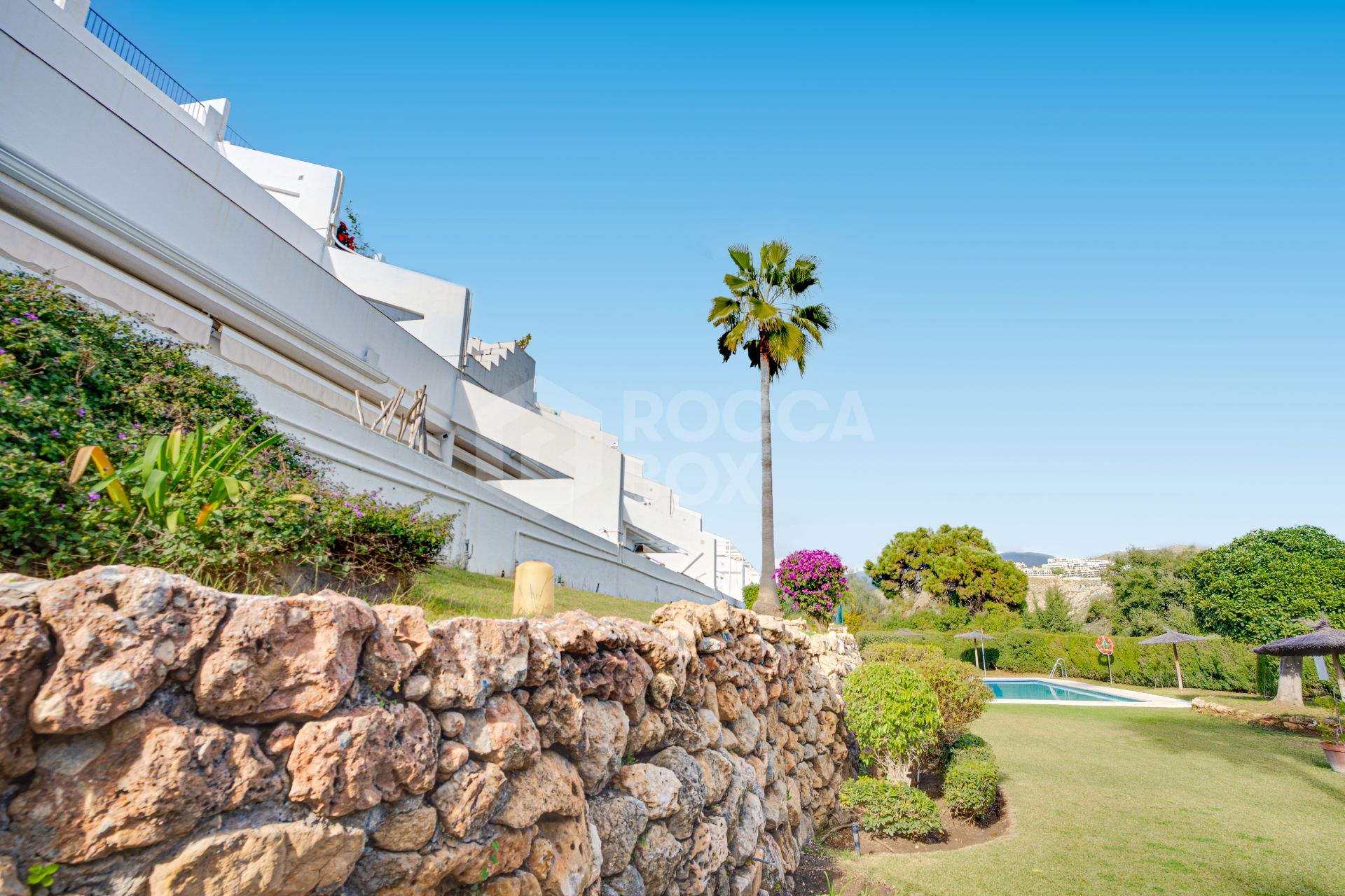 Impeccably refurbished, elevated south east facing ground-floor apartment located in the prestigious La Quinta Golf, Benahavis