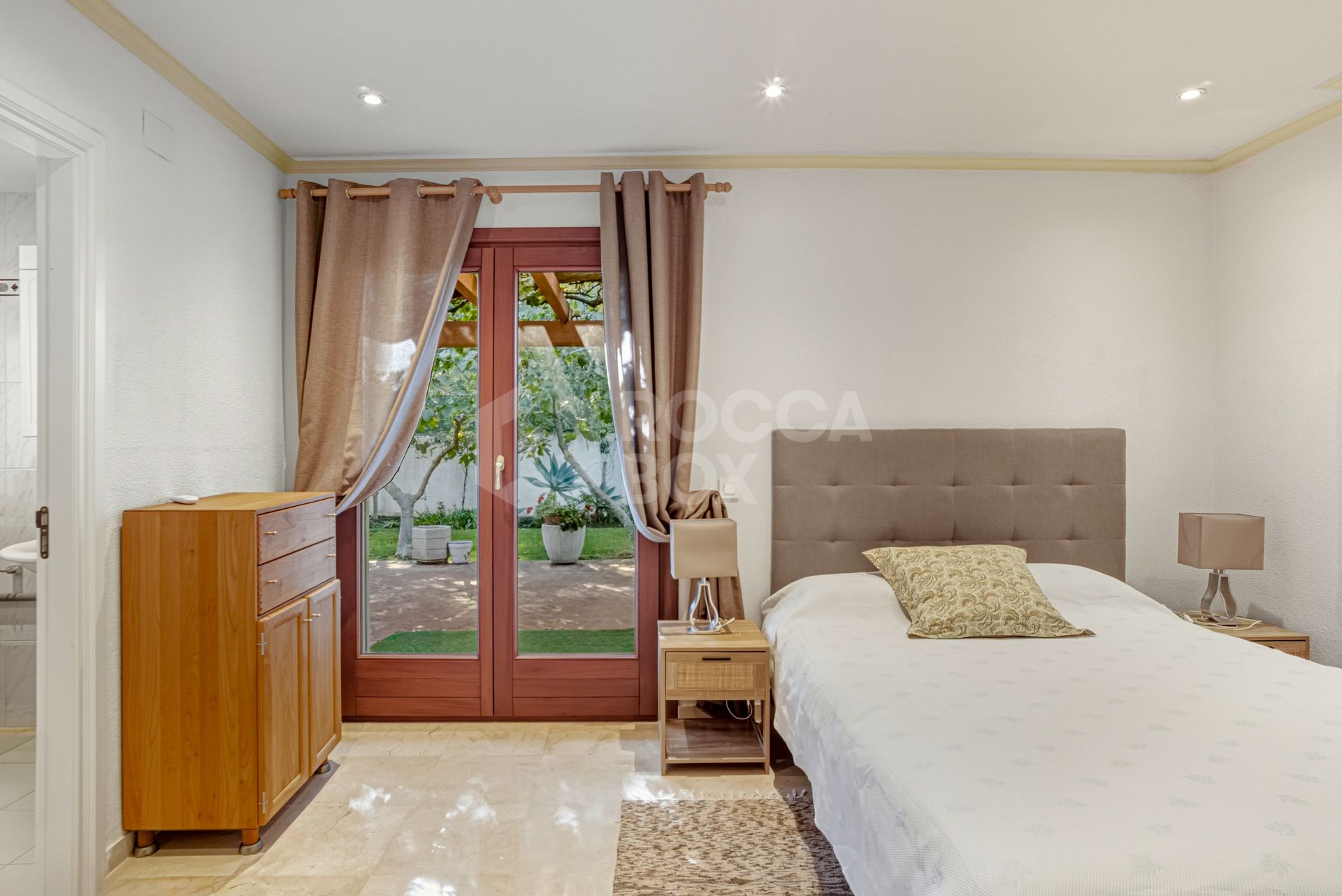 Elegant, southeast facing five bedroom Villa located on the New Golden Mile in Estepona, just steps from the beach