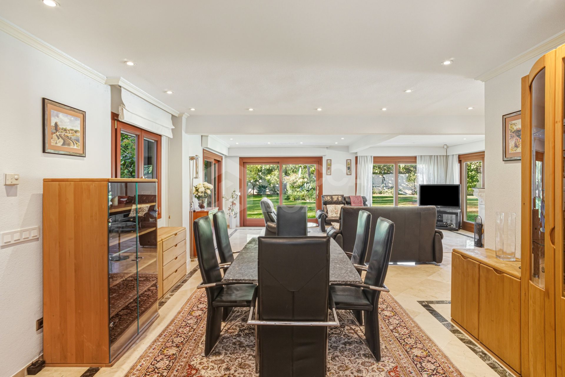 Elegant, southeast facing five bedroom Villa located on the New Golden Mile in Estepona, just steps from the beach