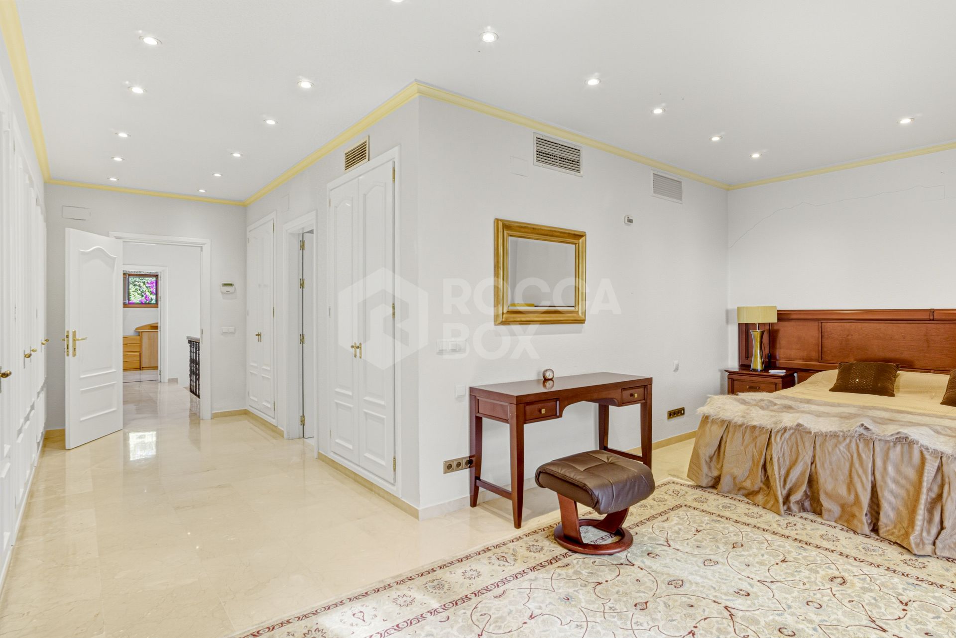 Elegant, southeast facing five bedroom Villa located on the New Golden Mile in Estepona, just steps from the beach