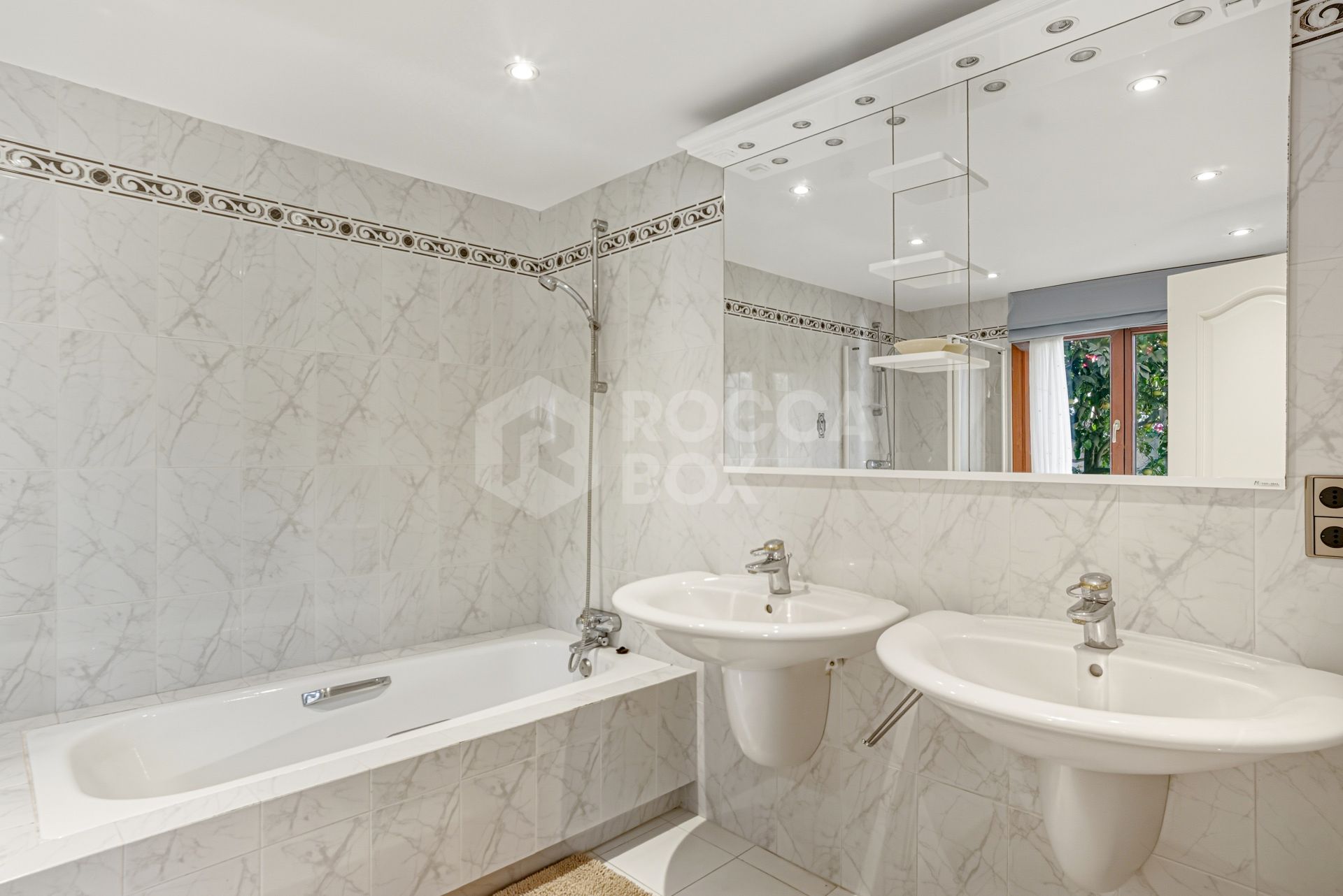 Elegant, southeast facing five bedroom Villa located on the New Golden Mile in Estepona, just steps from the beach