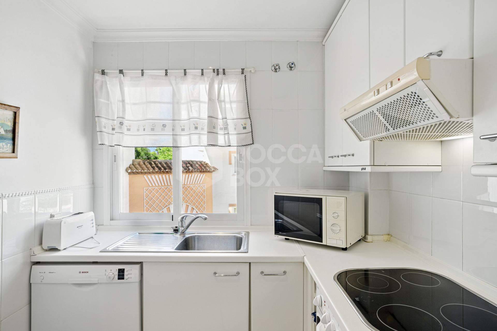 Exclusive Beachfront Two-Bedroom South-Facing Apartment with Sea Views in La Herradura, Marbella