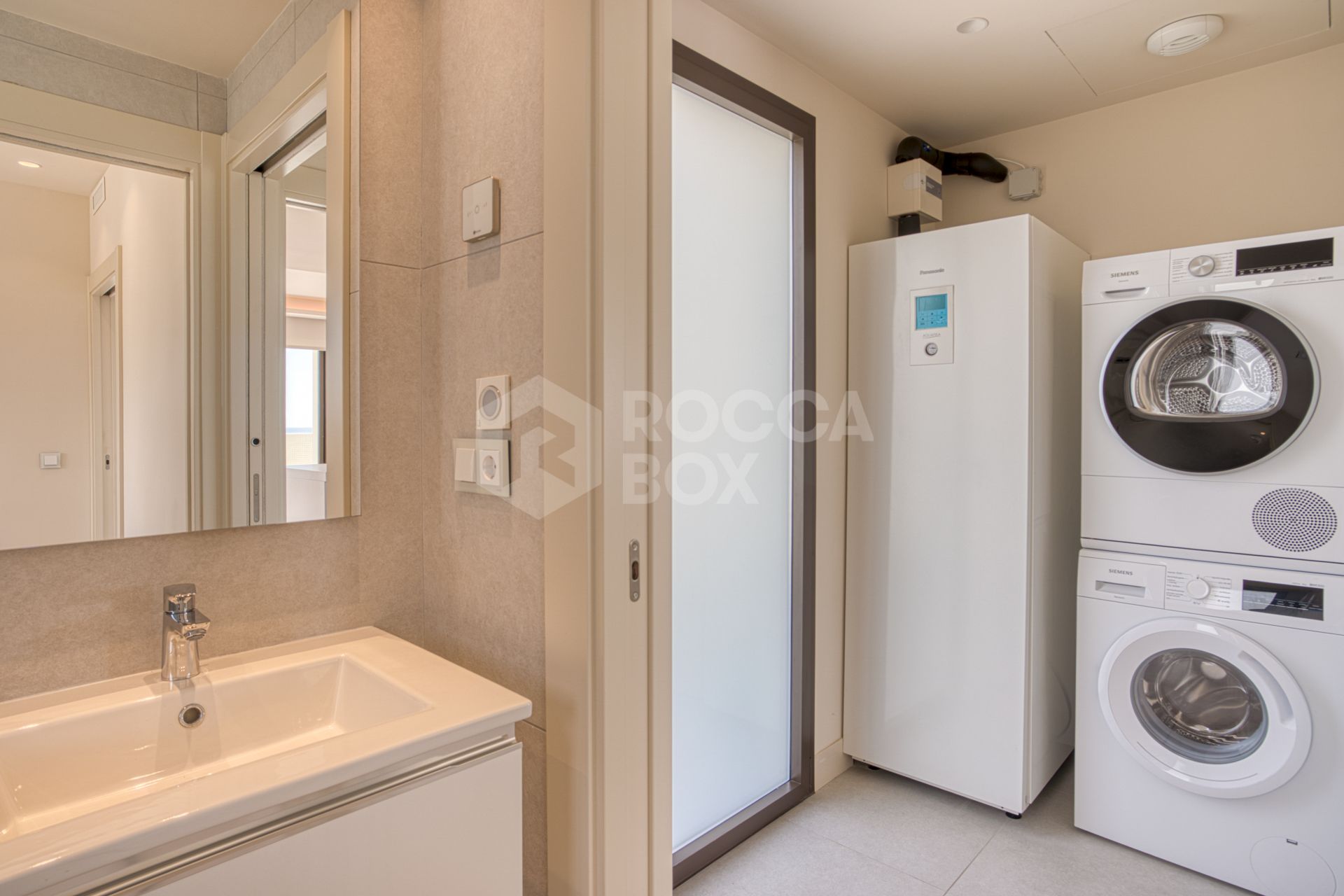 Luxurious south-facing four-bedroom duplex penthouse, frontline beach, located in a beachfront community on Marbella’s prestigious New Golden Mile with sea views.