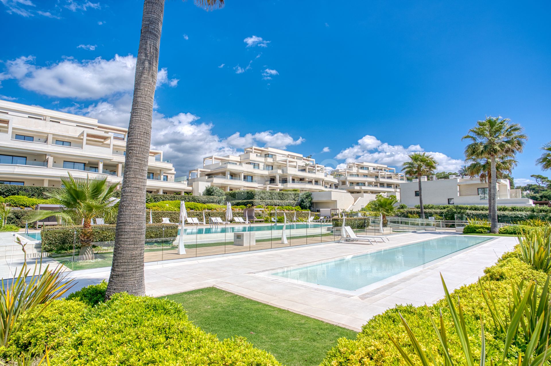 Luxurious south-facing four-bedroom duplex penthouse, frontline beach, located in a beachfront community on Marbella’s prestigious New Golden Mile with sea views.