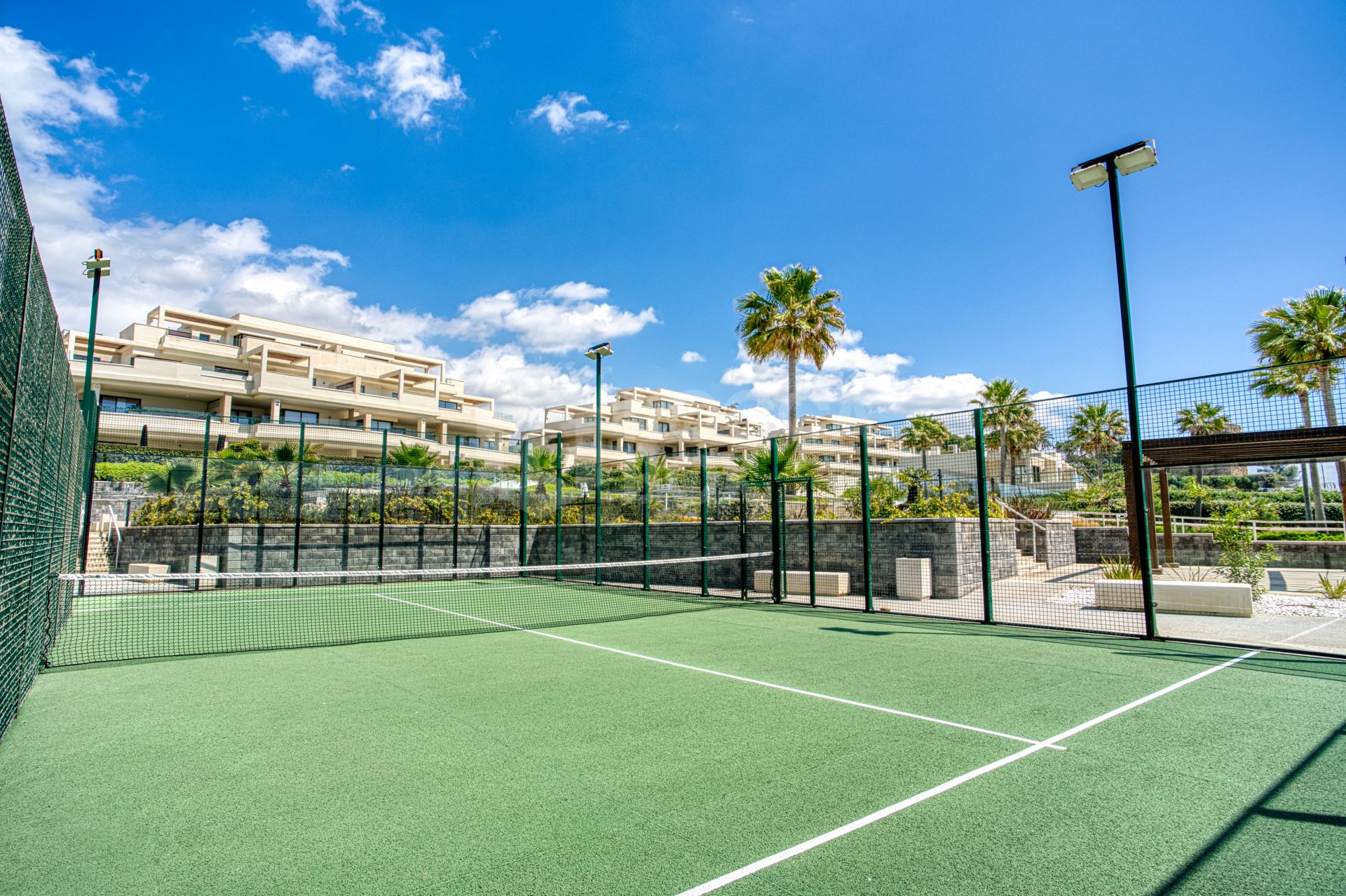 Luxurious south-facing four-bedroom duplex penthouse, frontline beach, located in a beachfront community on Marbella’s prestigious New Golden Mile with sea views.