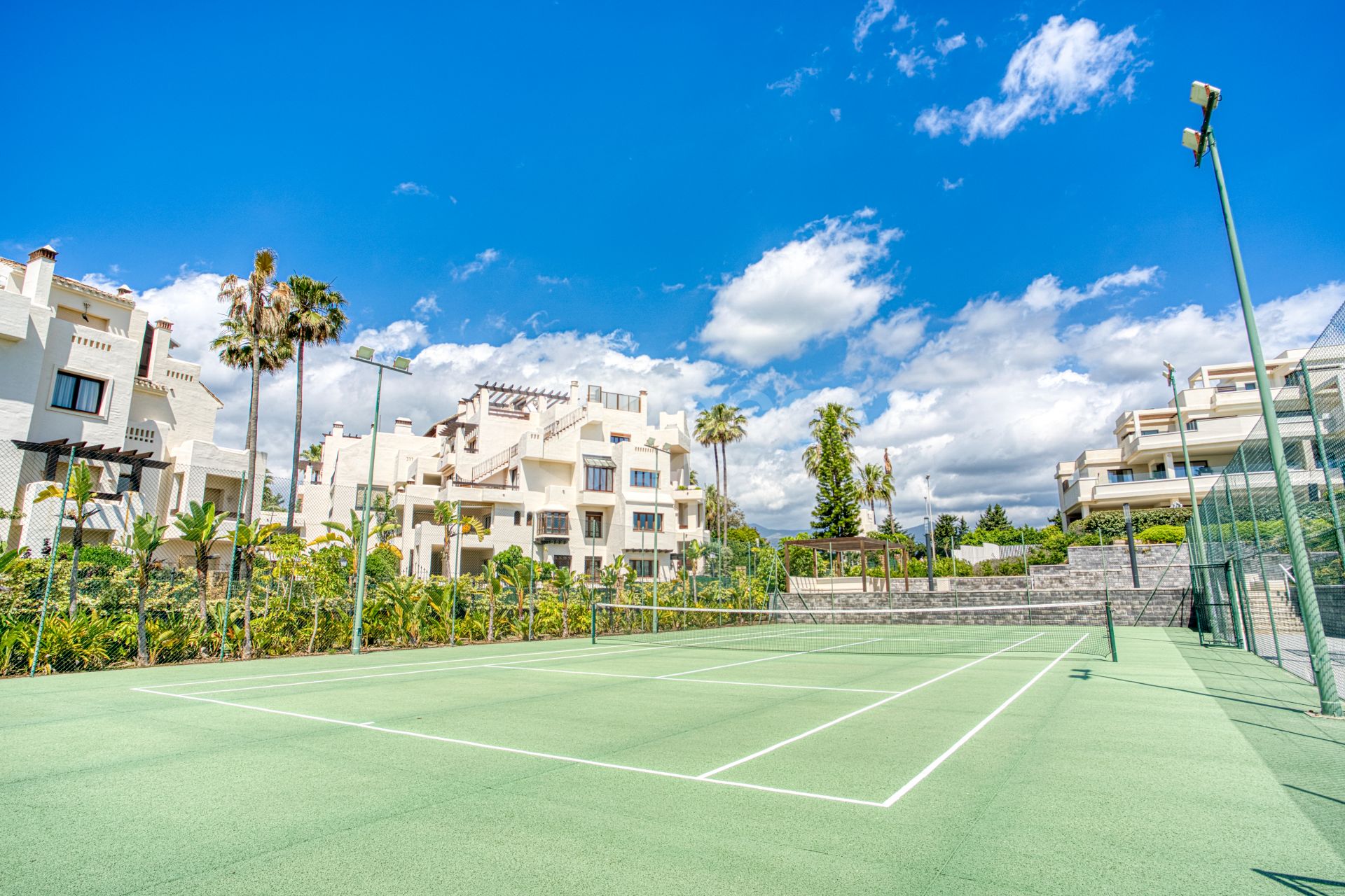 Luxurious south-facing four-bedroom duplex penthouse, frontline beach, located in a beachfront community on Marbella’s prestigious New Golden Mile with sea views.