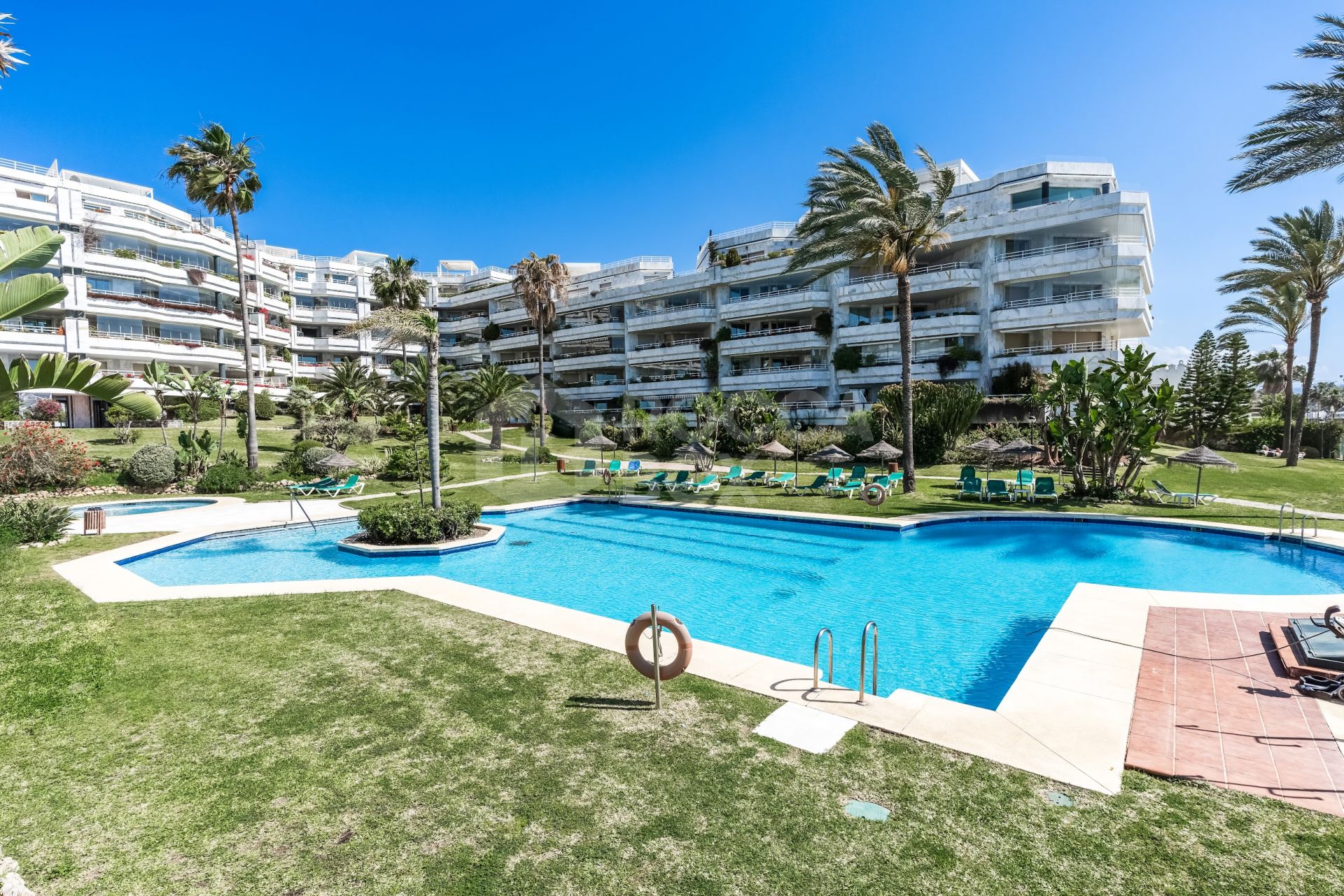 Impressive two bedroom, south west facing apartment in the beachfront community Playa Esmeralda