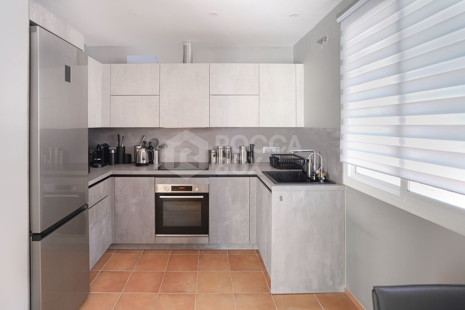 Elegant two bedroom, south west facing townhouse set within an exclusive gated community of Nueva Andalucia, Marbella