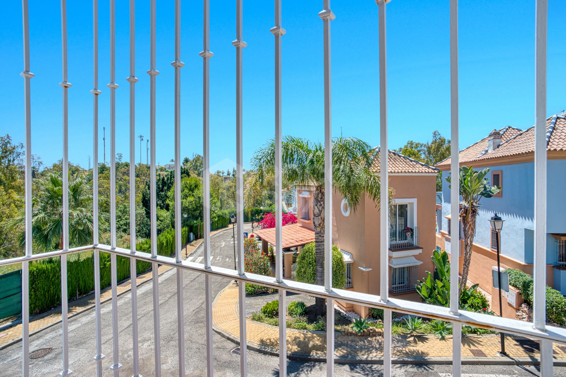 Elegant two bedroom, south west facing townhouse set within an exclusive gated community of Nueva Andalucia, Marbella