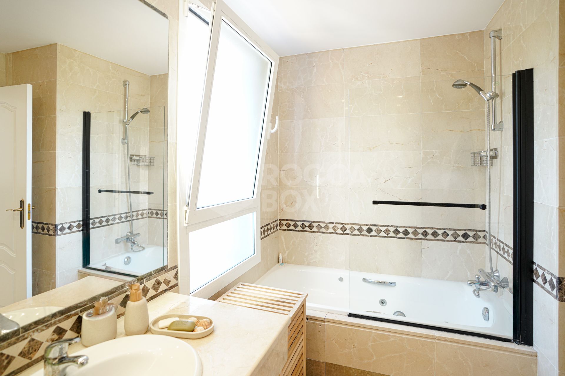 Elegant two bedroom, south west facing townhouse set within an exclusive gated community of Nueva Andalucia, Marbella