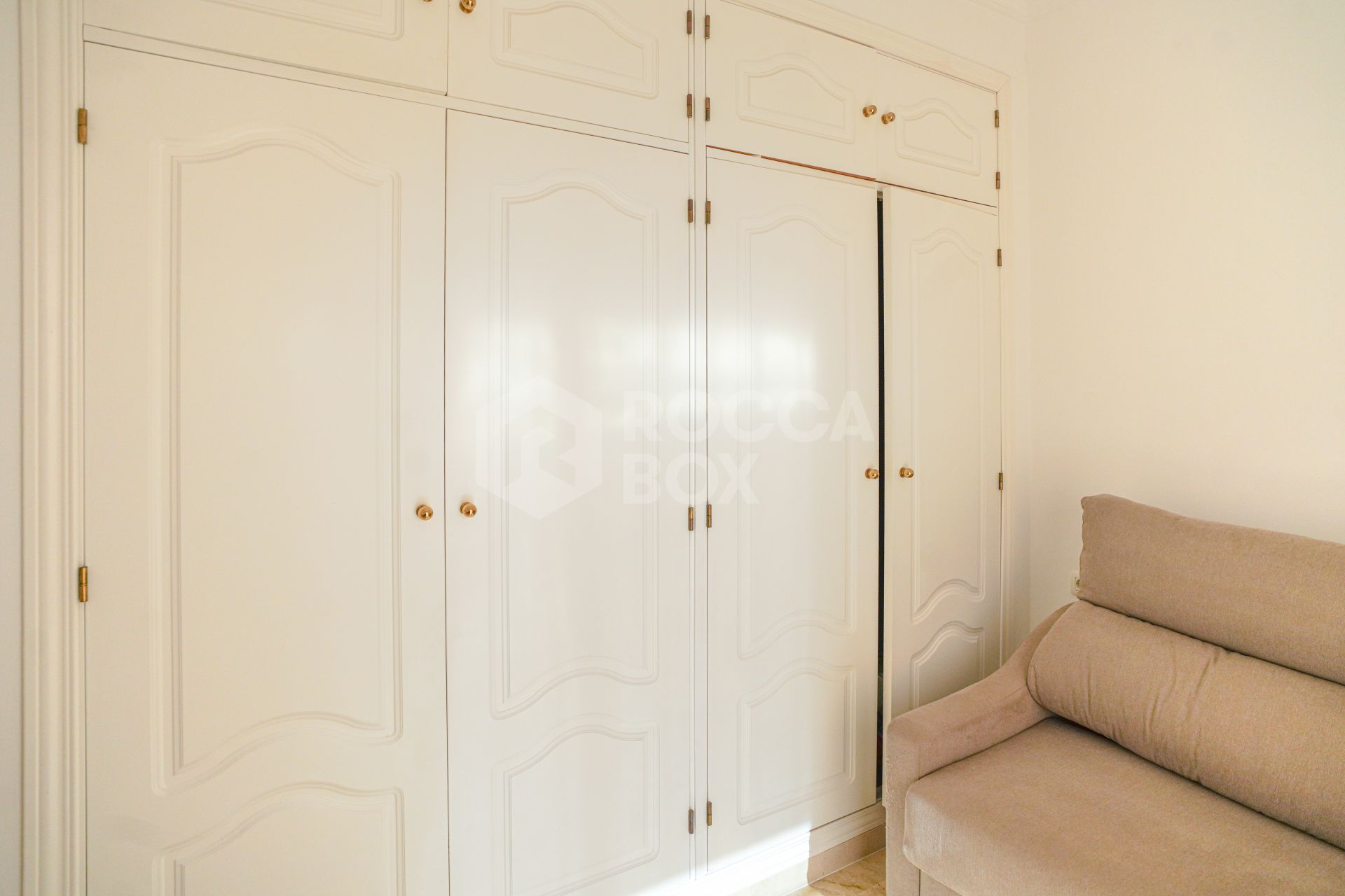 Elegant two bedroom, south west facing townhouse set within an exclusive gated community of Nueva Andalucia, Marbella