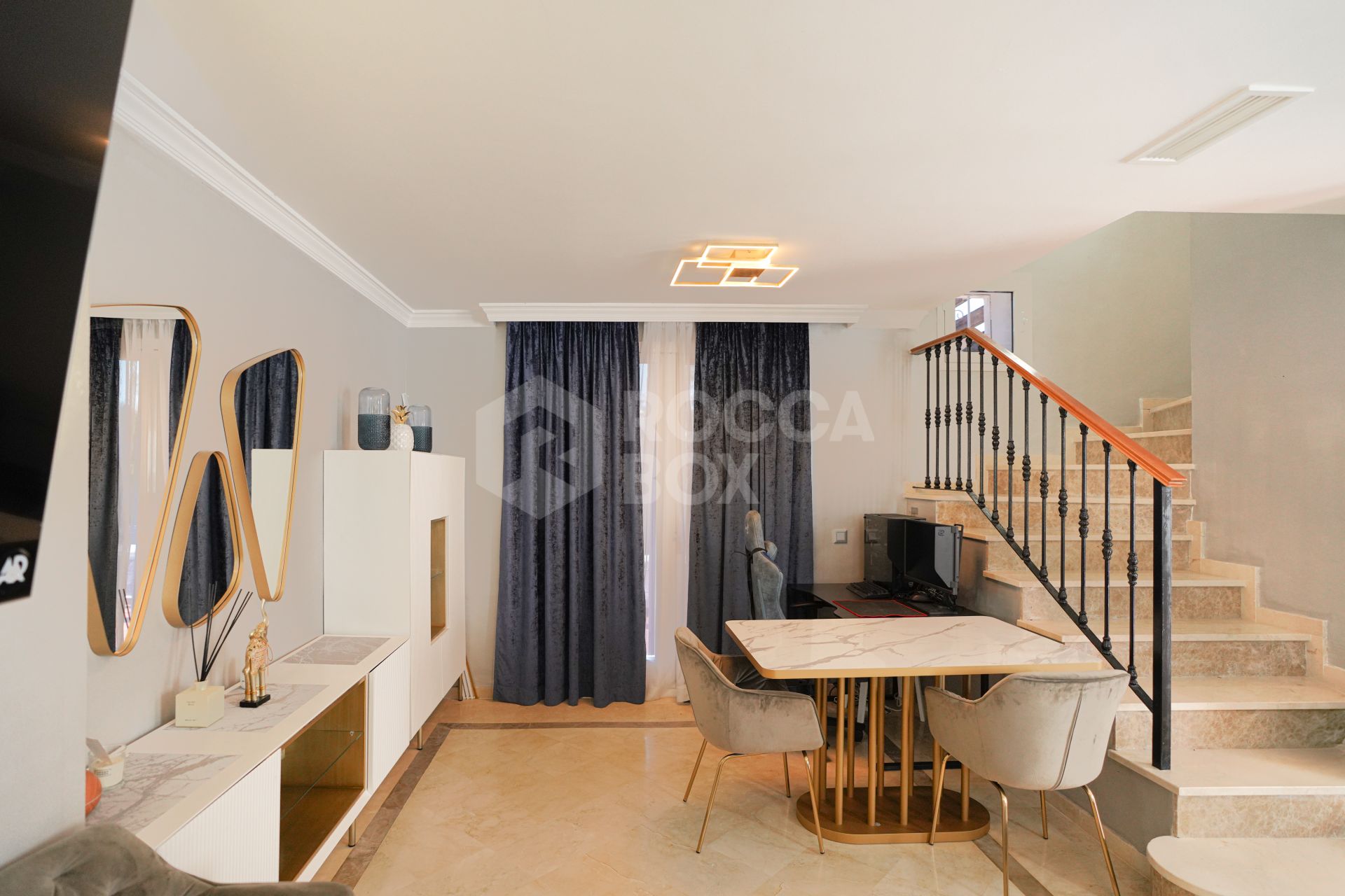 Elegant two bedroom, south west facing townhouse set within an exclusive gated community of Nueva Andalucia, Marbella