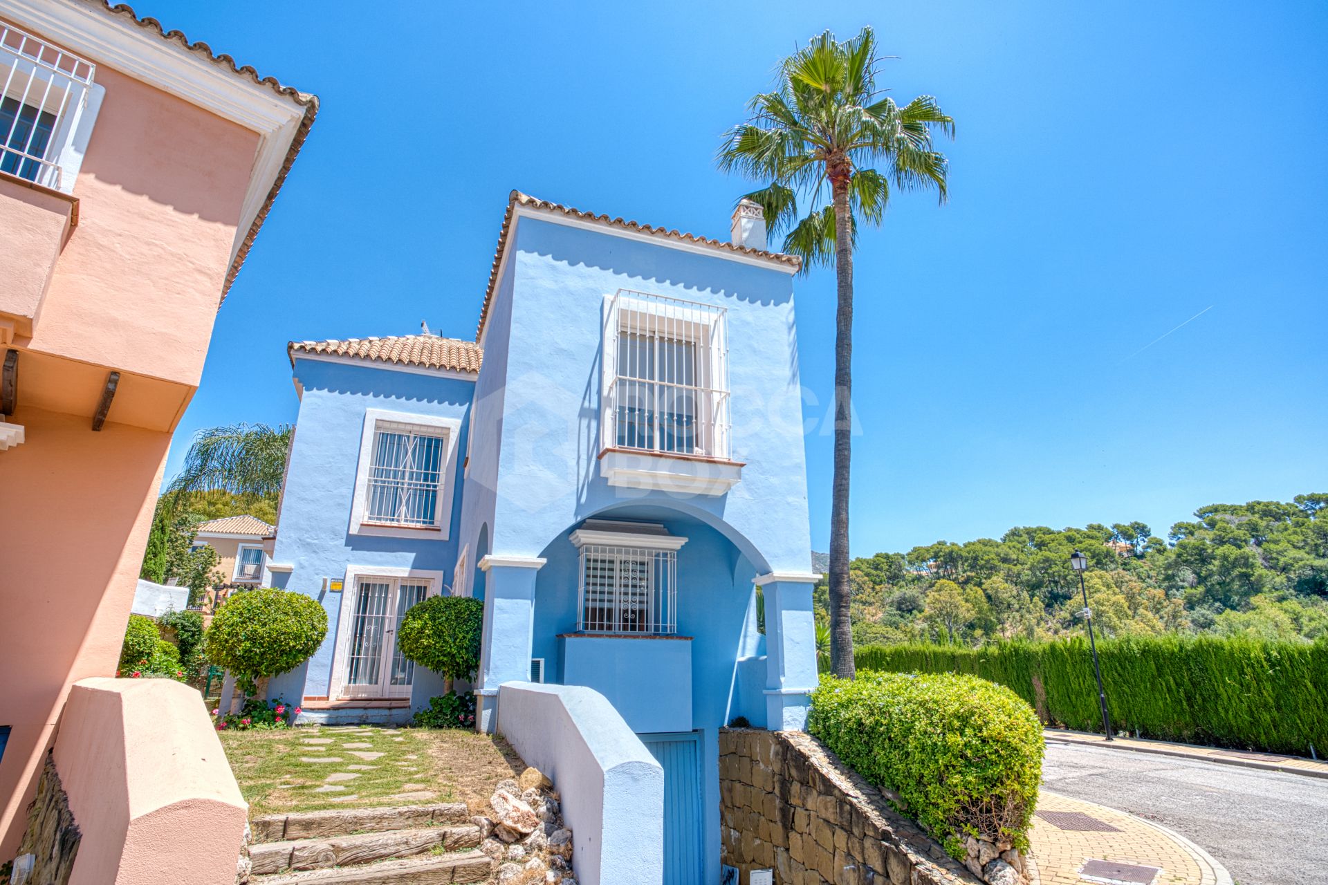 Elegant two bedroom, south west facing townhouse set within an exclusive gated community of Nueva Andalucia, Marbella