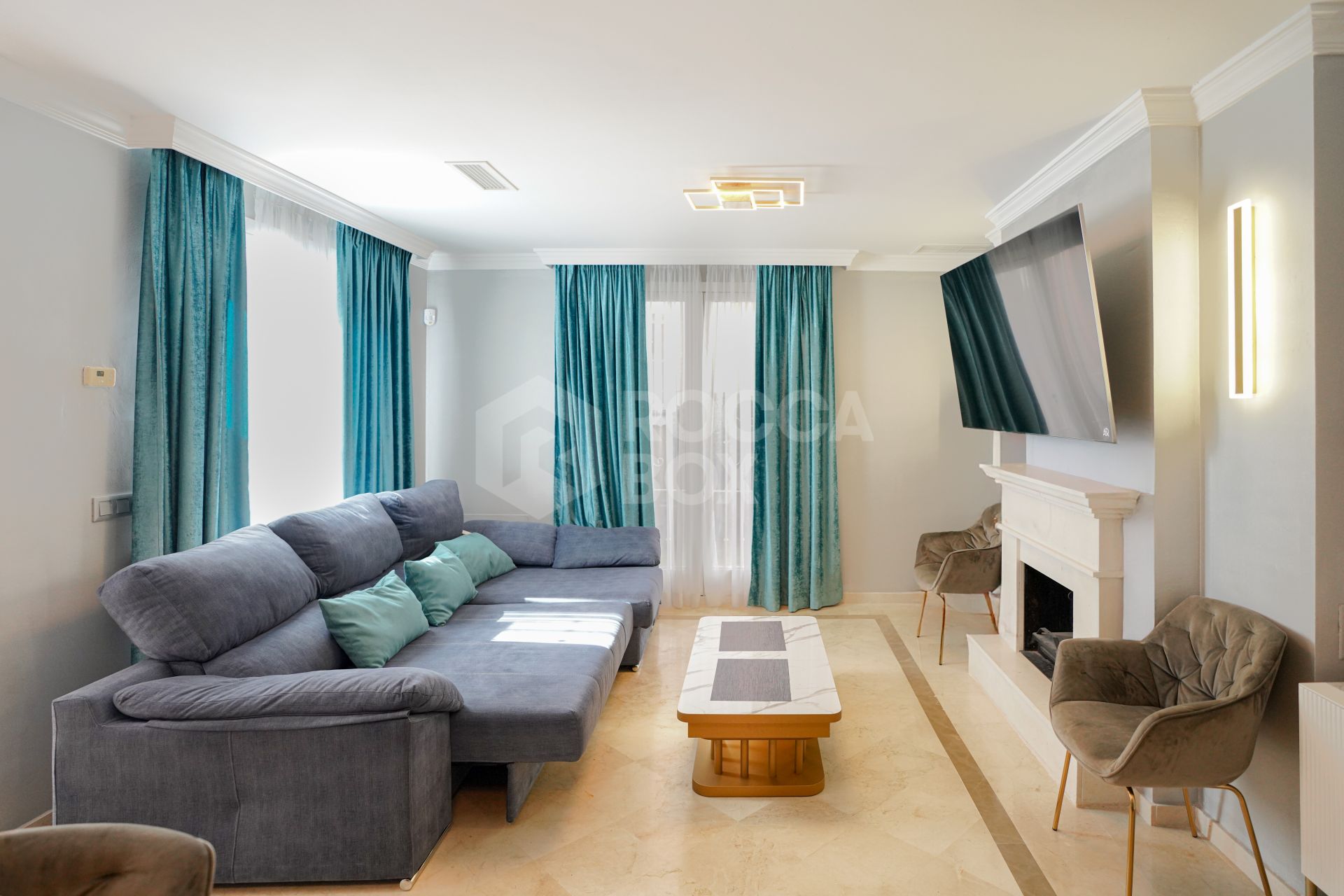 Elegant two bedroom, south west facing townhouse set within an exclusive gated community of Nueva Andalucia, Marbella