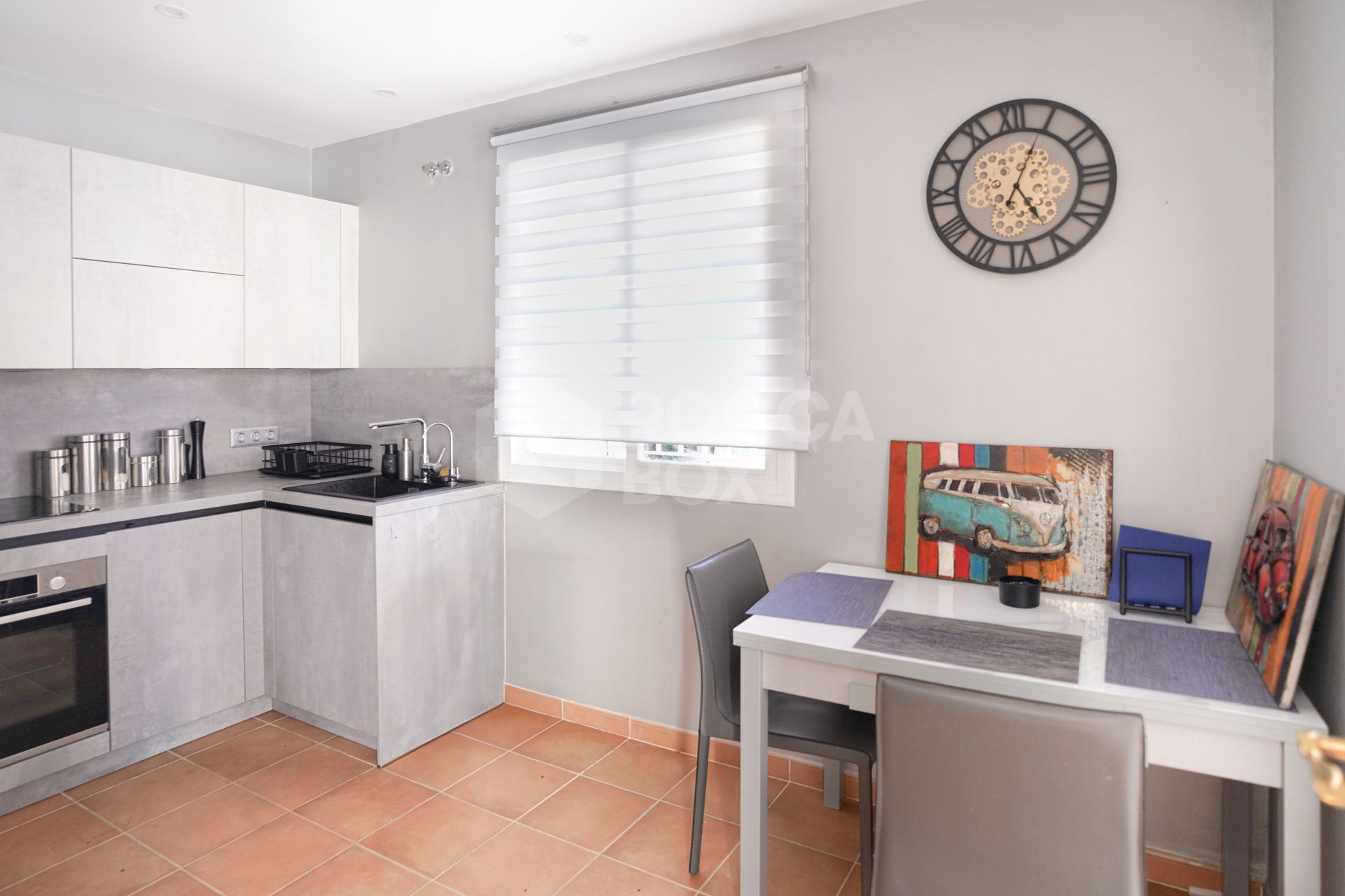 Elegant two bedroom, south west facing townhouse set within an exclusive gated community of Nueva Andalucia, Marbella