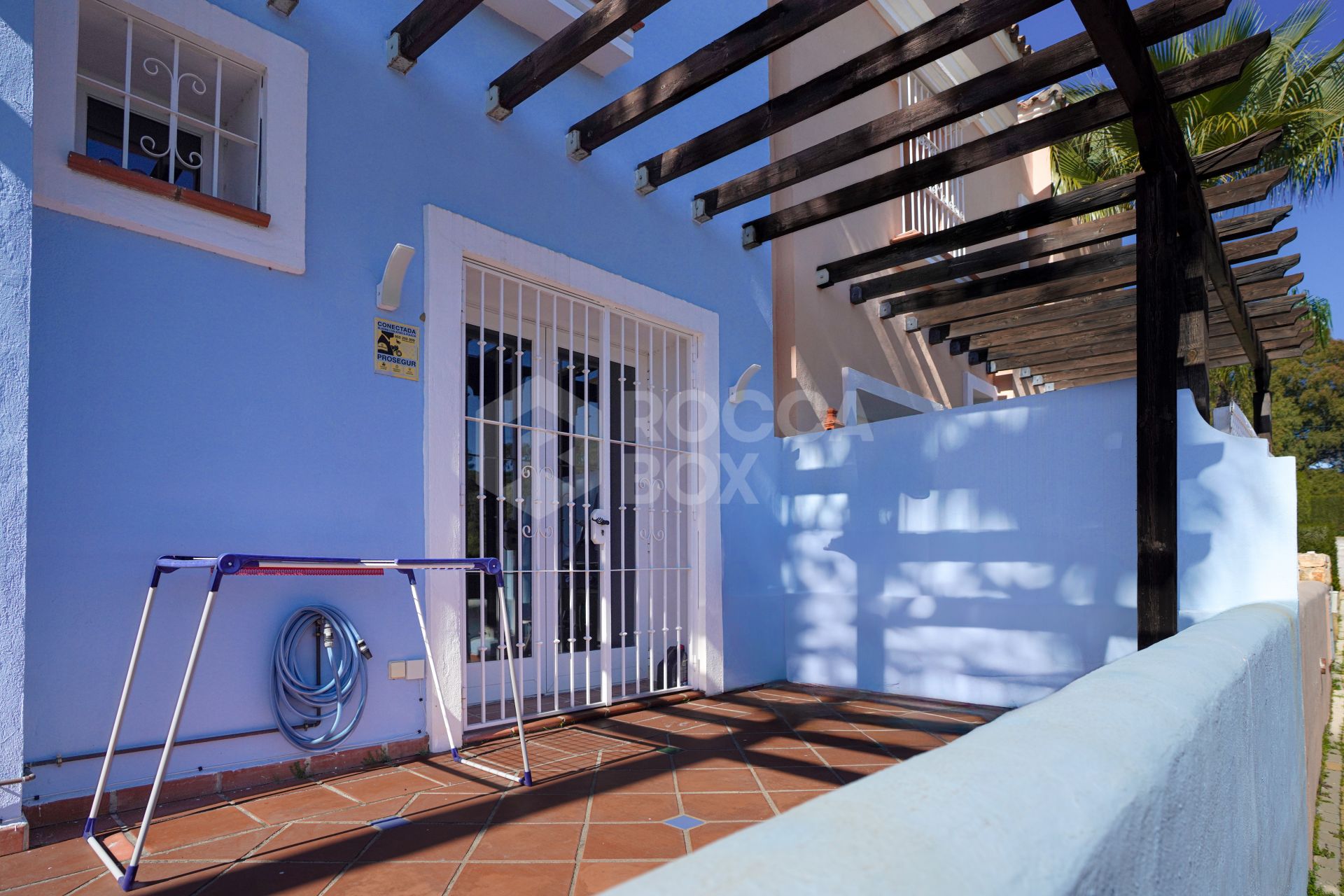 Elegant two bedroom, south west facing townhouse set within an exclusive gated community of Nueva Andalucia, Marbella