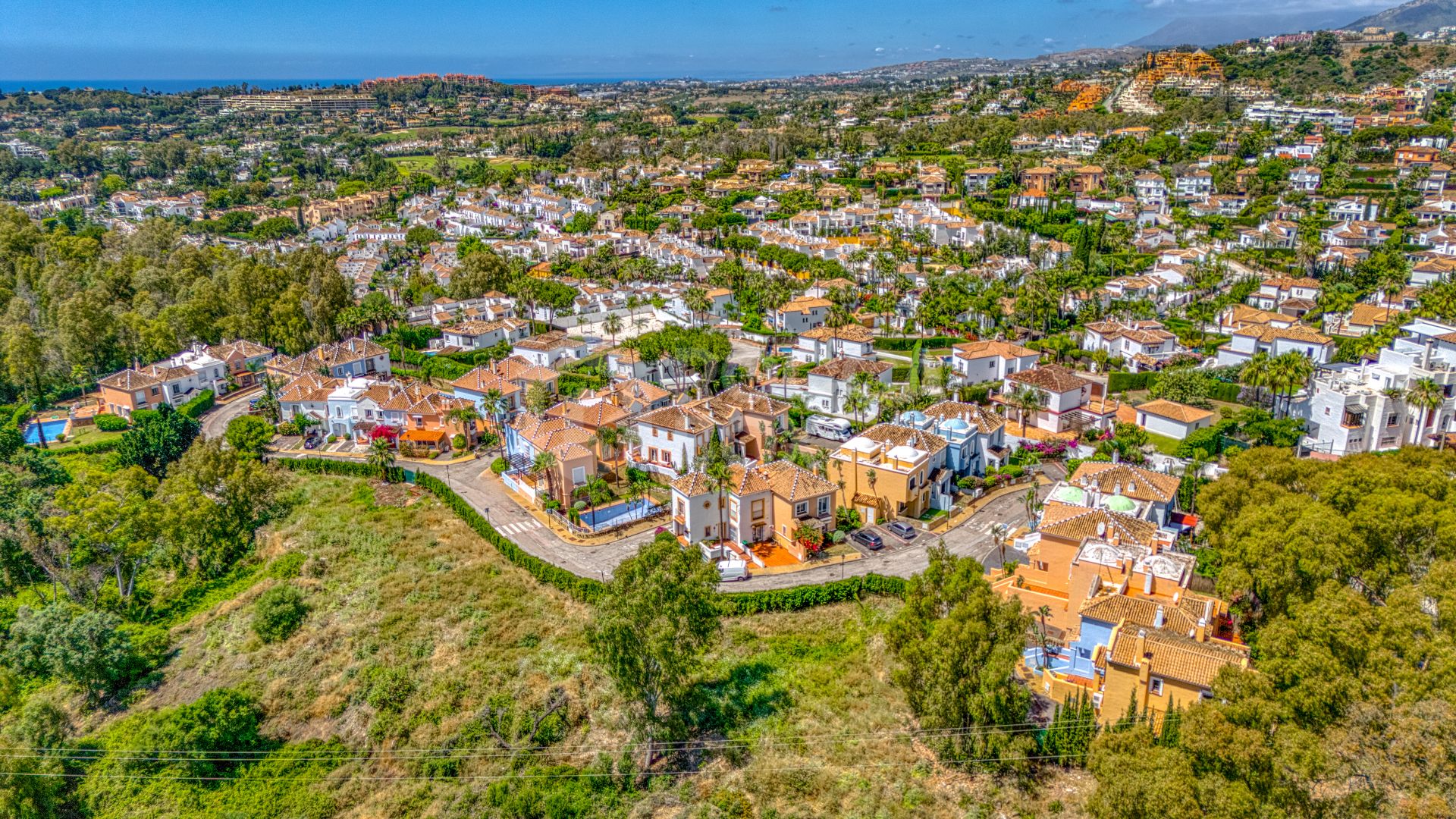 Elegant two bedroom, south west facing townhouse set within an exclusive gated community of Nueva Andalucia, Marbella