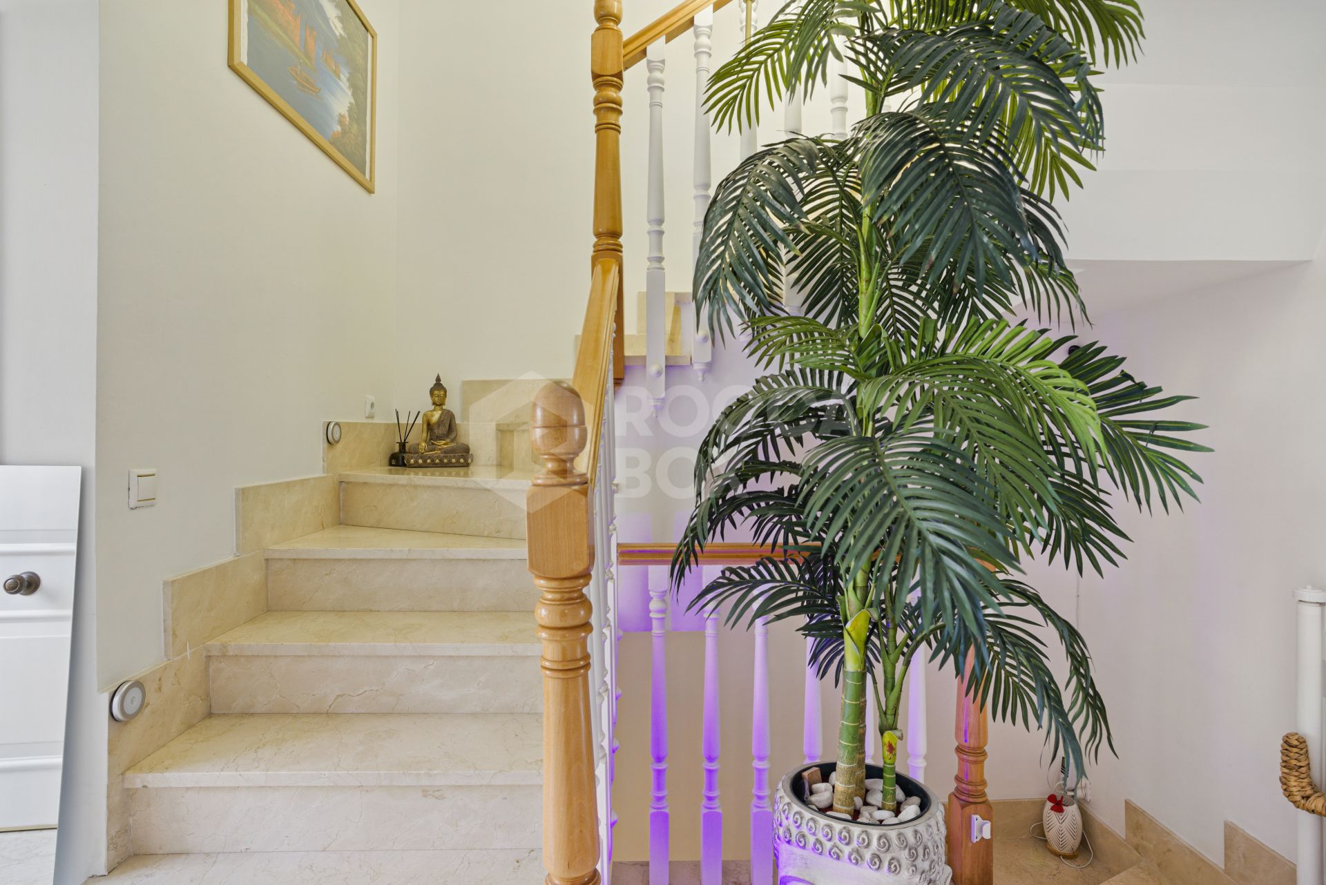 Four bedroom beautifully reformed south facing townhouse in a gated residential community in Calahonda