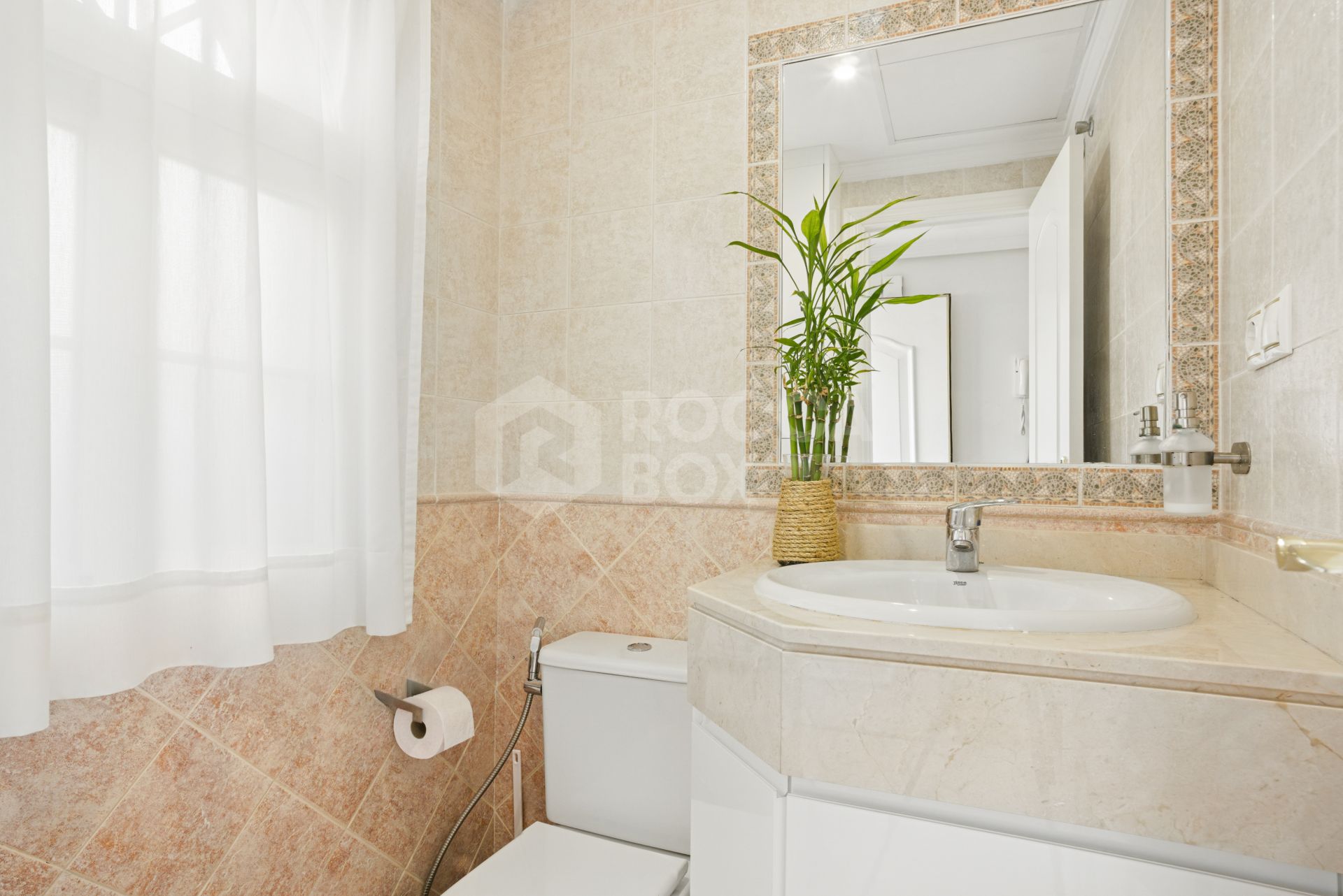 Four bedroom beautifully reformed south facing townhouse in a gated residential community in Calahonda