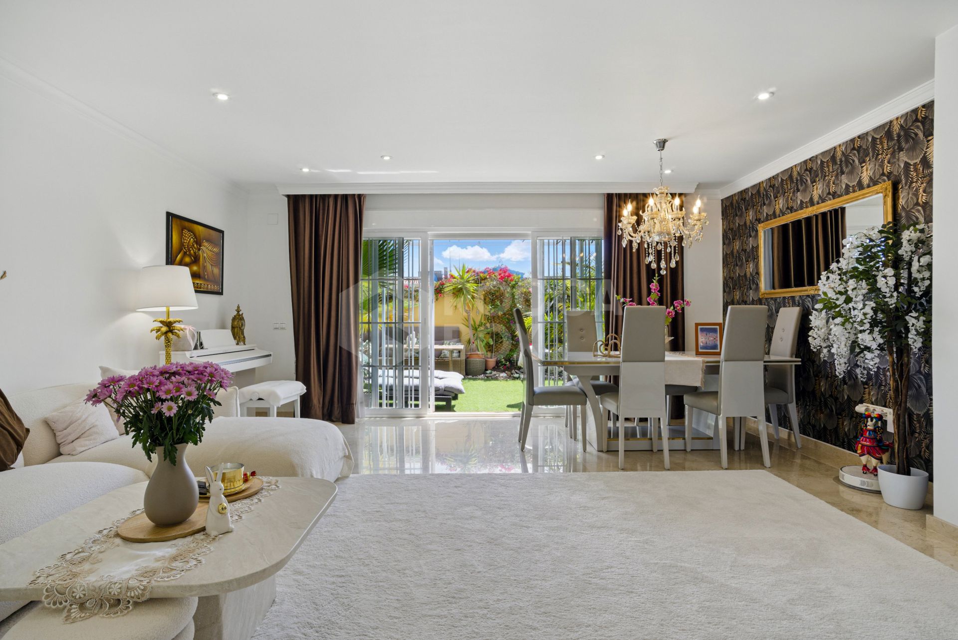Four bedroom beautifully reformed south facing townhouse in a gated residential community in Calahonda