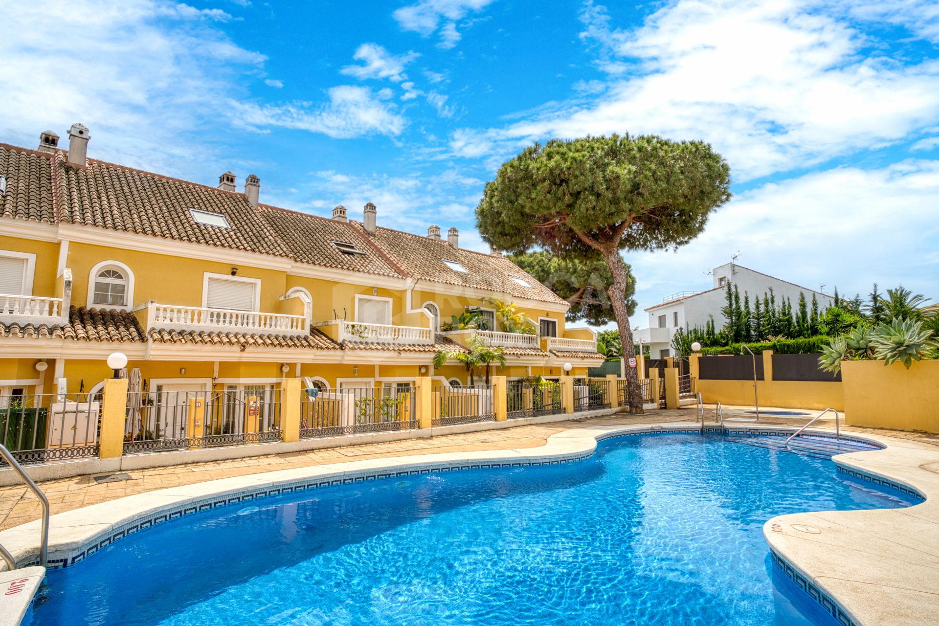 Four bedroom beautifully reformed south facing townhouse in a gated residential community in Calahonda