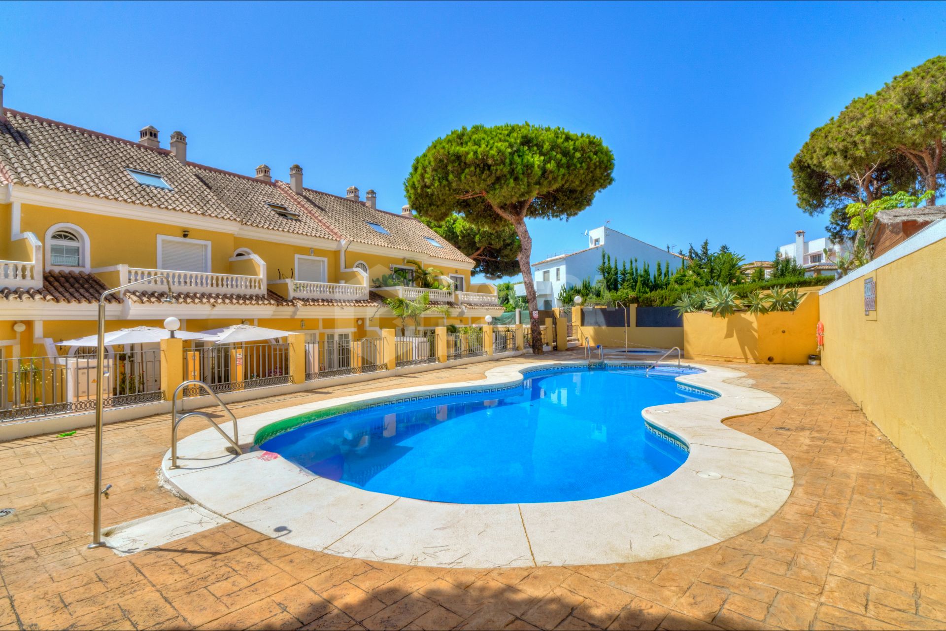 Four bedroom beautifully reformed south facing townhouse in a gated residential community in Calahonda