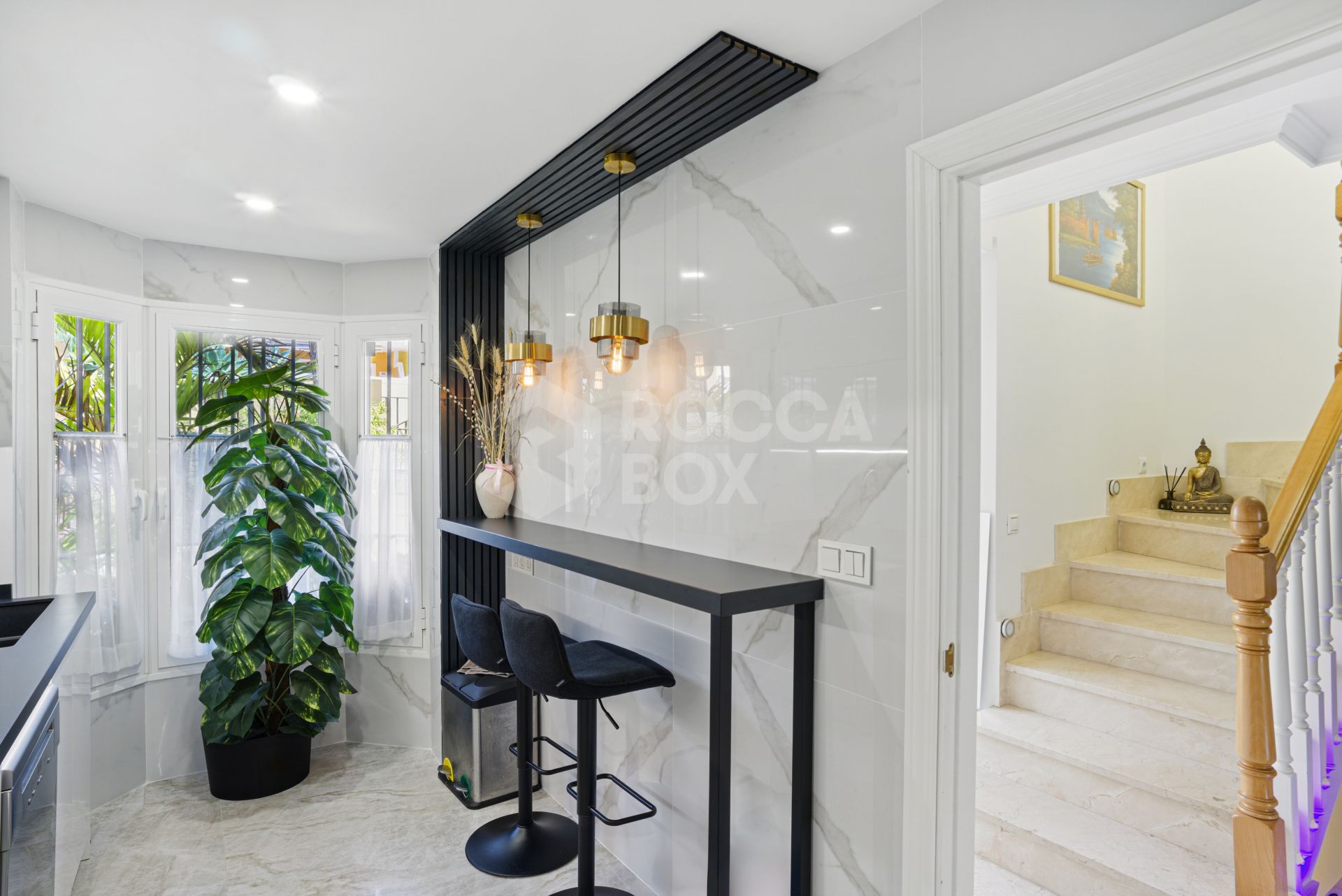Four bedroom beautifully reformed south facing townhouse in a gated residential community in Calahonda