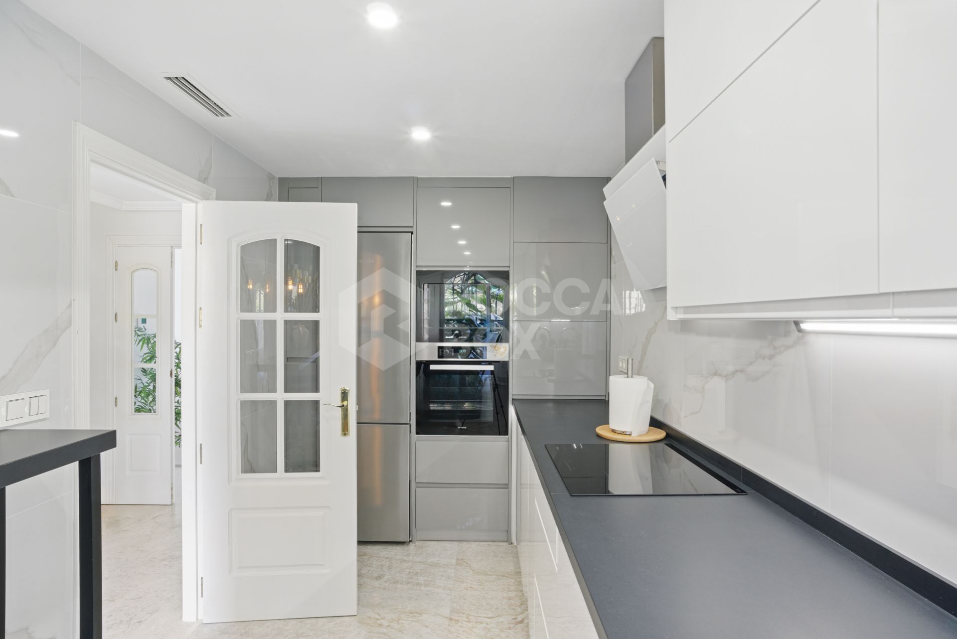 Four bedroom beautifully reformed south facing townhouse in a gated residential community in Calahonda