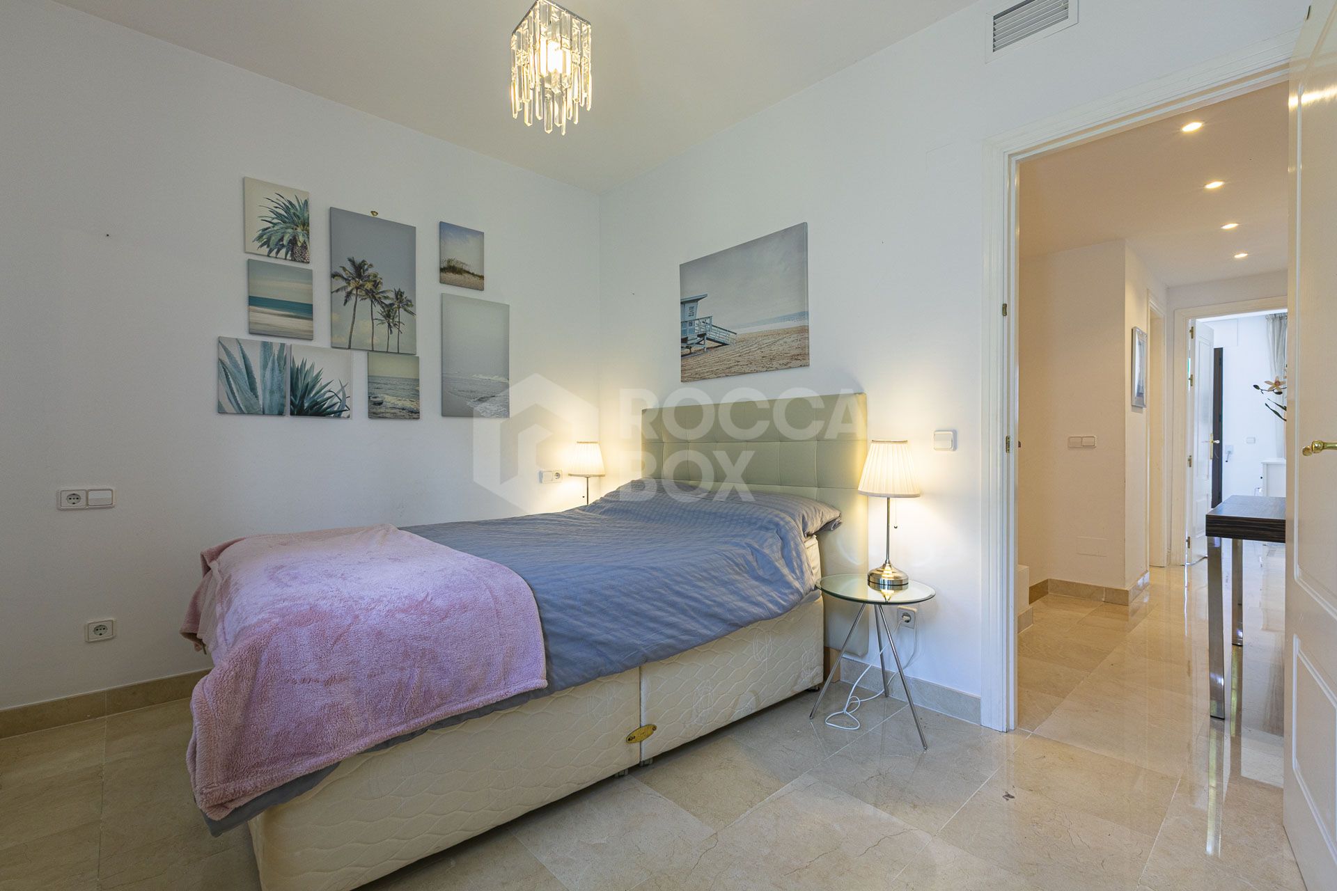Beautiful south-facing, four bedroom townhouse in Los Almendros, part of the secure Los Arqueros Golf community in Benahavís