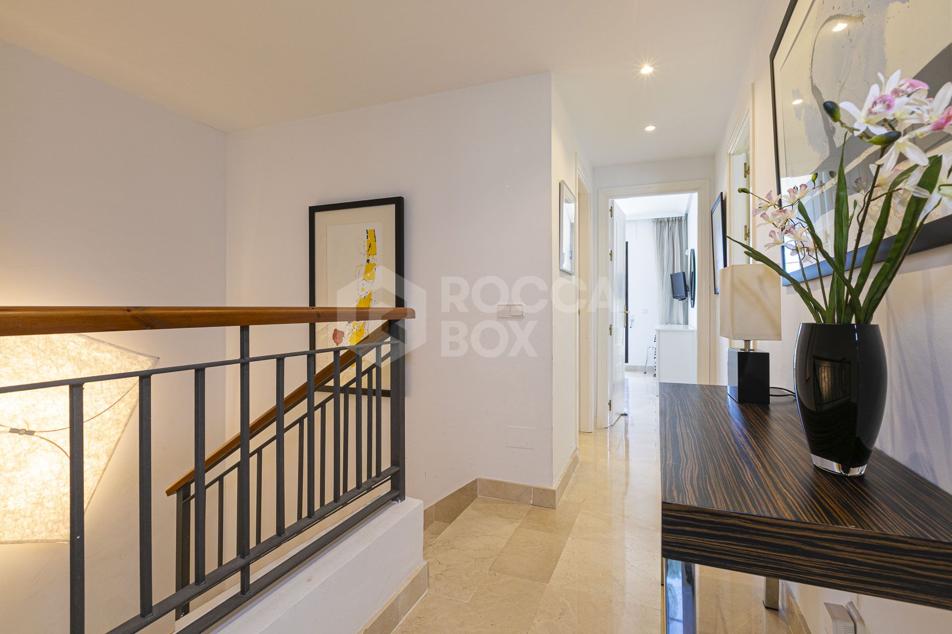 Beautiful south-facing, four bedroom townhouse in Los Almendros, part of the secure Los Arqueros Golf community in Benahavís