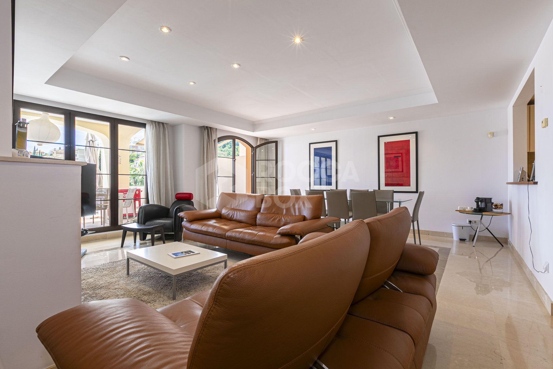 Beautiful south-facing, four bedroom townhouse in Los Almendros, part of the secure Los Arqueros Golf community in Benahavís