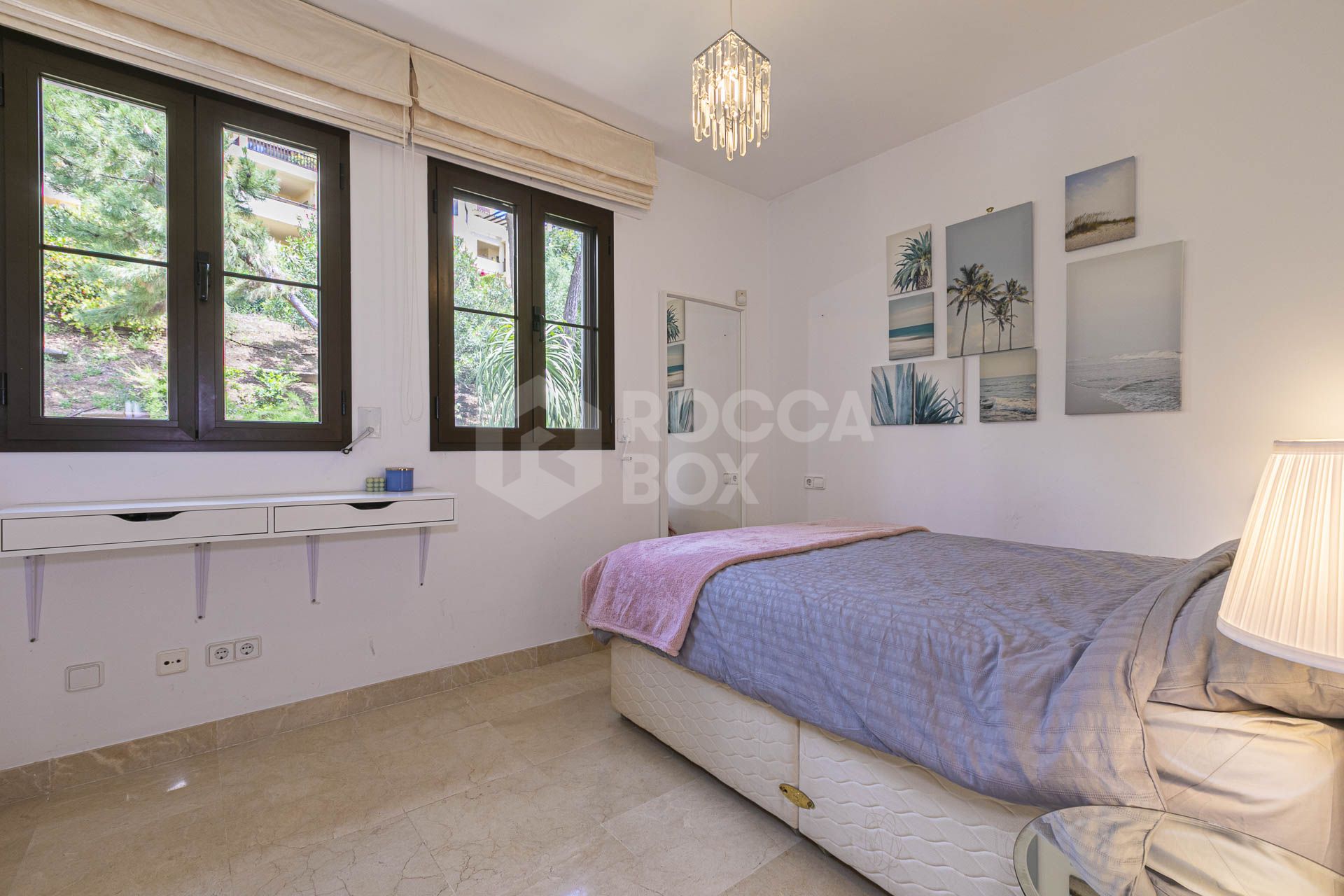 Beautiful south-facing, four bedroom townhouse in Los Almendros, part of the secure Los Arqueros Golf community in Benahavís