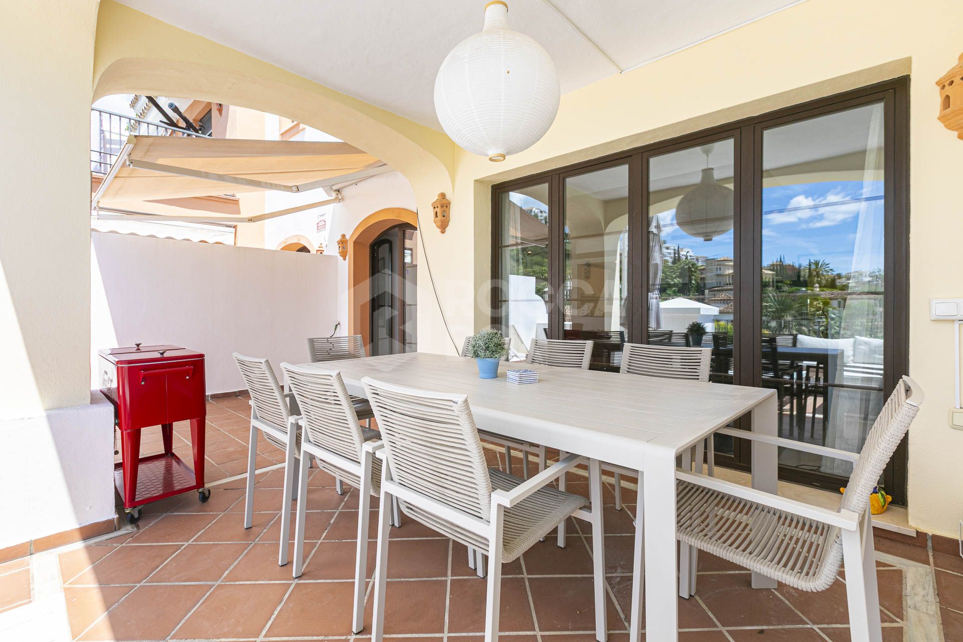 Beautiful south-facing, four bedroom townhouse in Los Almendros, part of the secure Los Arqueros Golf community in Benahavís