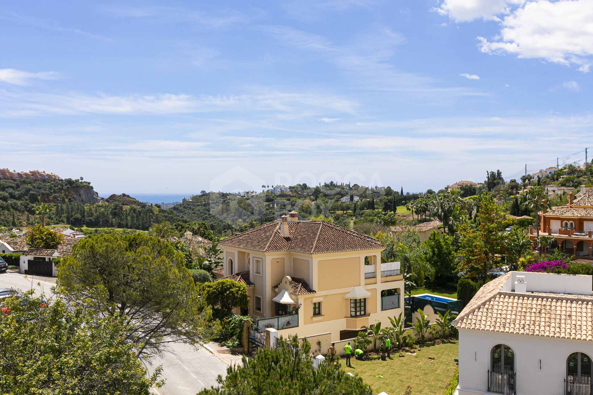 Beautiful south-facing, four bedroom townhouse in Los Almendros, part of the secure Los Arqueros Golf community in Benahavís