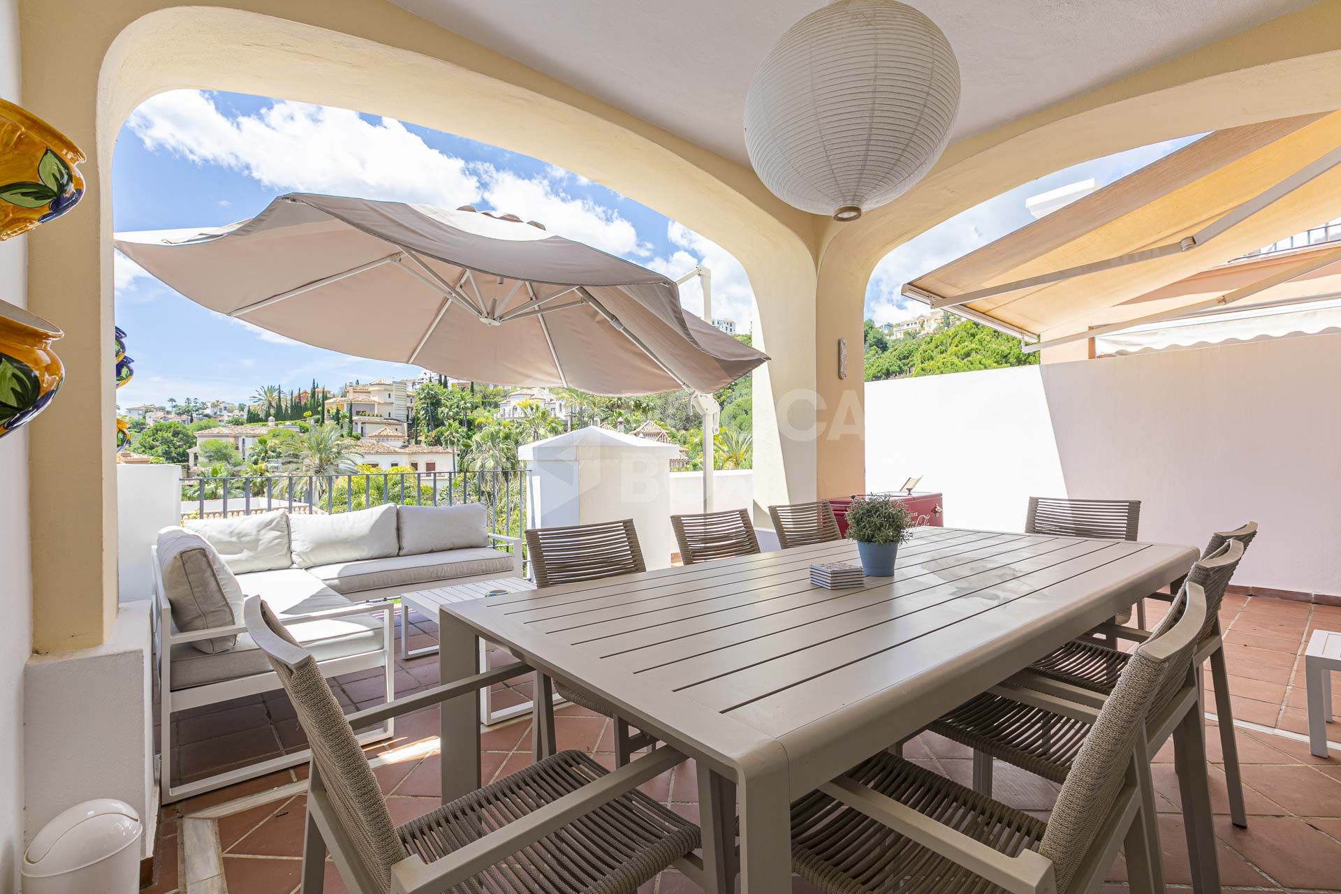 Beautiful south-facing, four bedroom townhouse in Los Almendros, part of the secure Los Arqueros Golf community in Benahavís