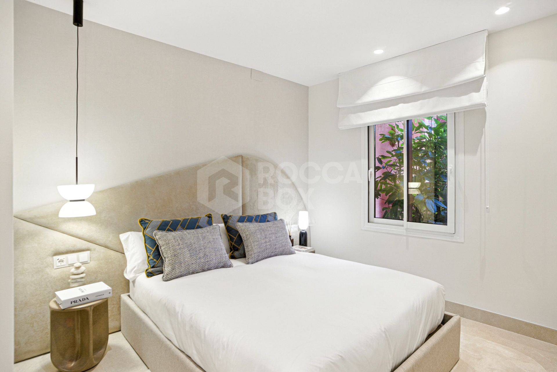 Impeccably renovated, south facing beach front, garden apartment located in the exclusive Menara Beach community on the sought-after New Golden Mile