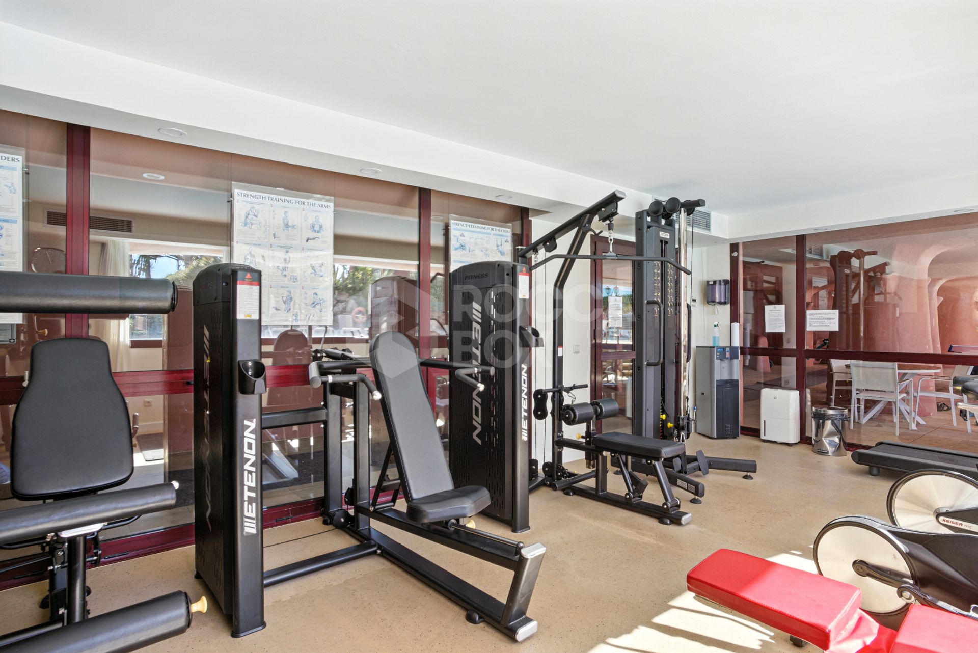 Impeccably renovated, south facing beach front, garden apartment located in the exclusive Menara Beach community on the sought-after New Golden Mile