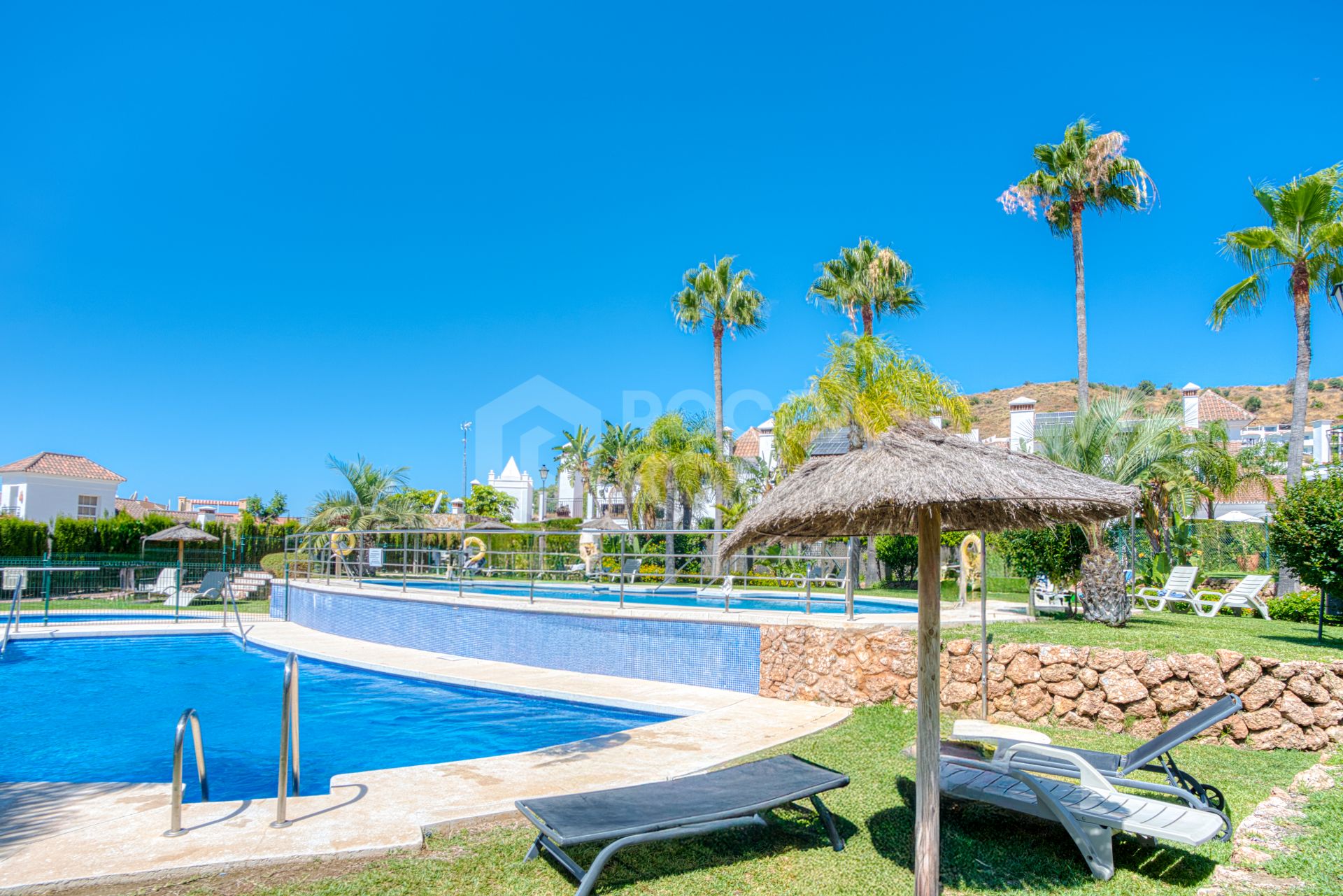 Stylish south west facing, three-bedroom semi detached townhouse located in Riviera del Sol