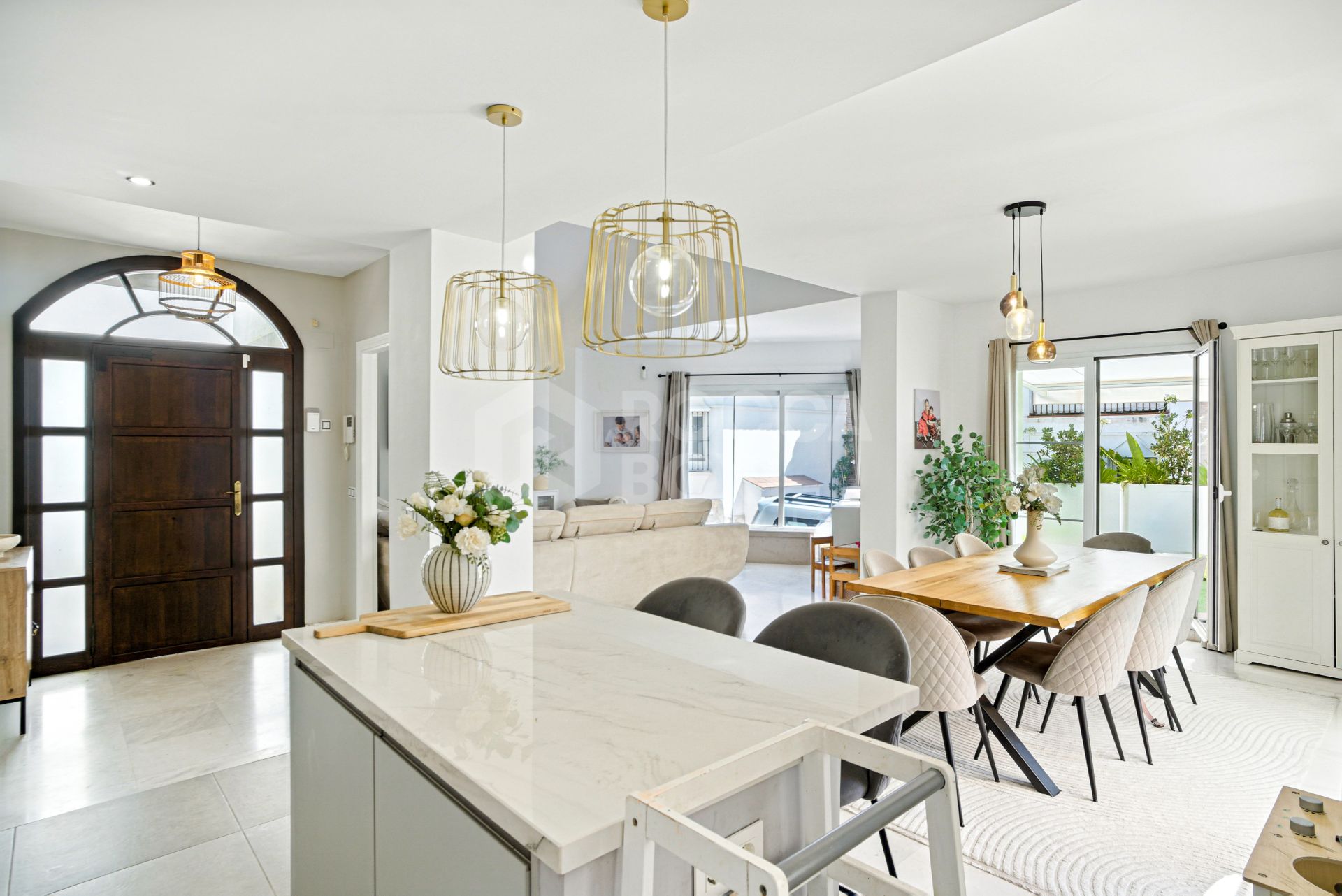 Stylish south west facing, three-bedroom semi detached townhouse located in Riviera del Sol