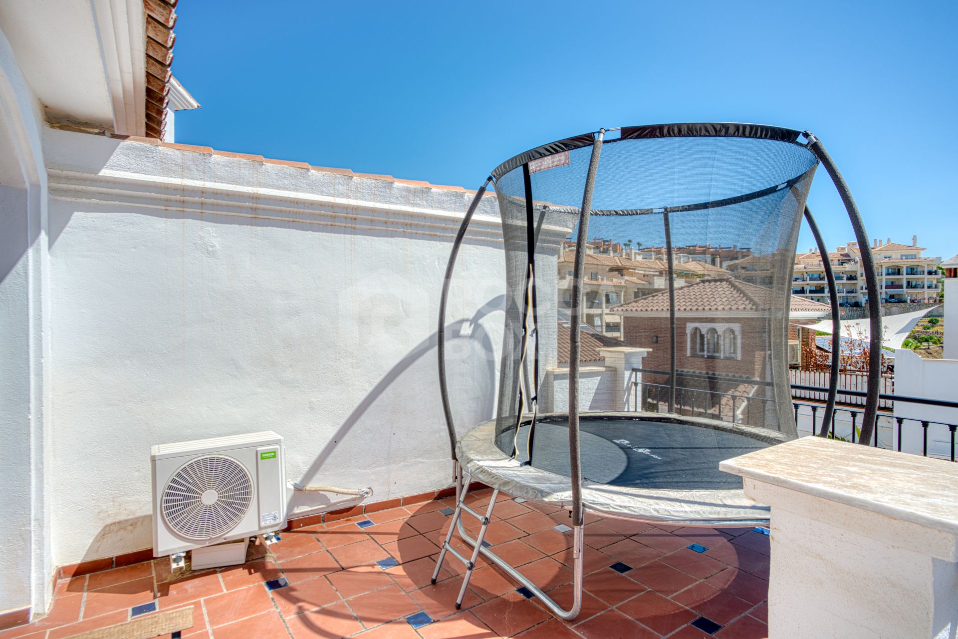 Stylish south west facing, three-bedroom semi detached townhouse located in Riviera del Sol