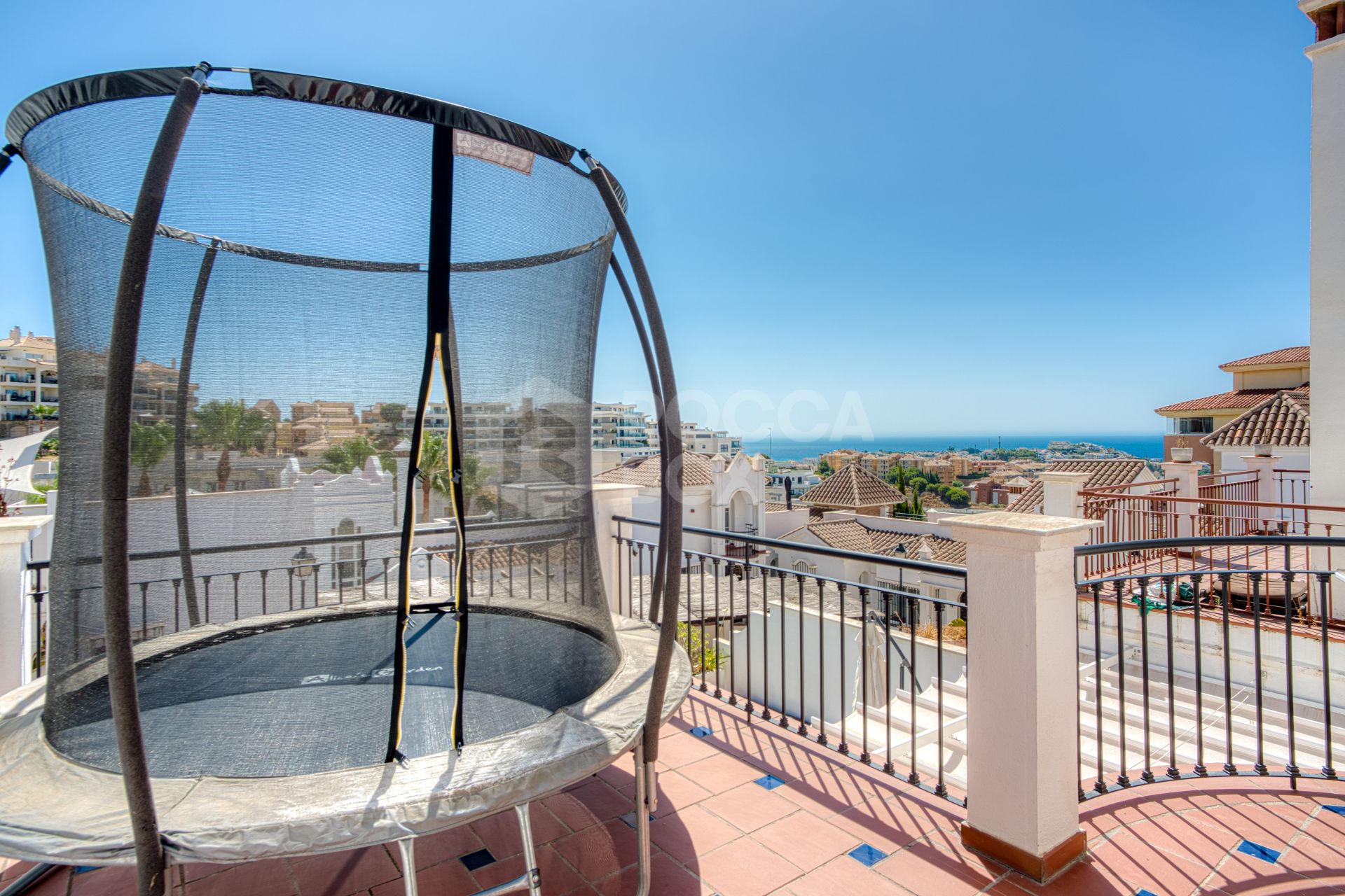Stylish south west facing, three-bedroom semi detached townhouse located in Riviera del Sol