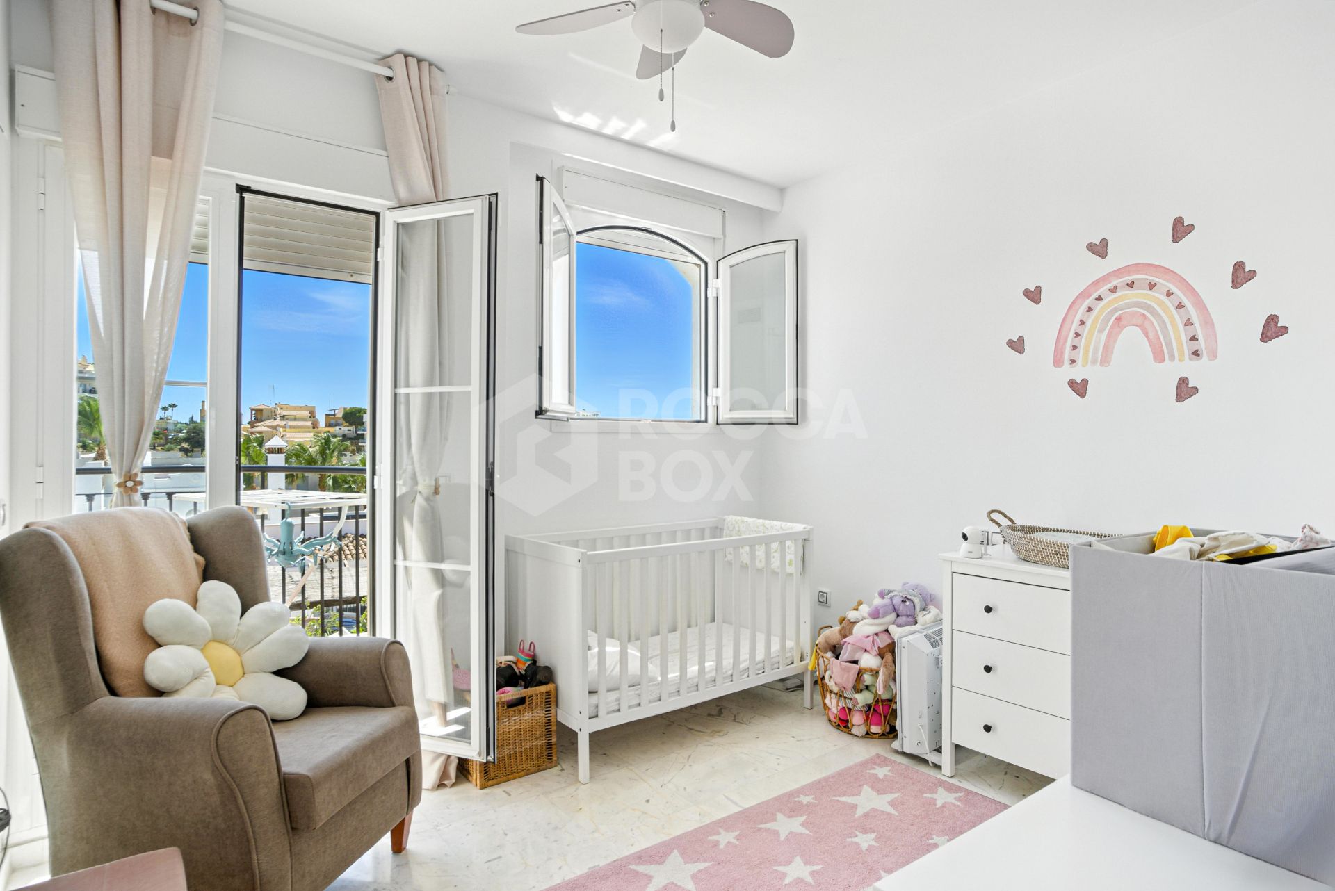 Stylish south west facing, three-bedroom semi detached townhouse located in Riviera del Sol
