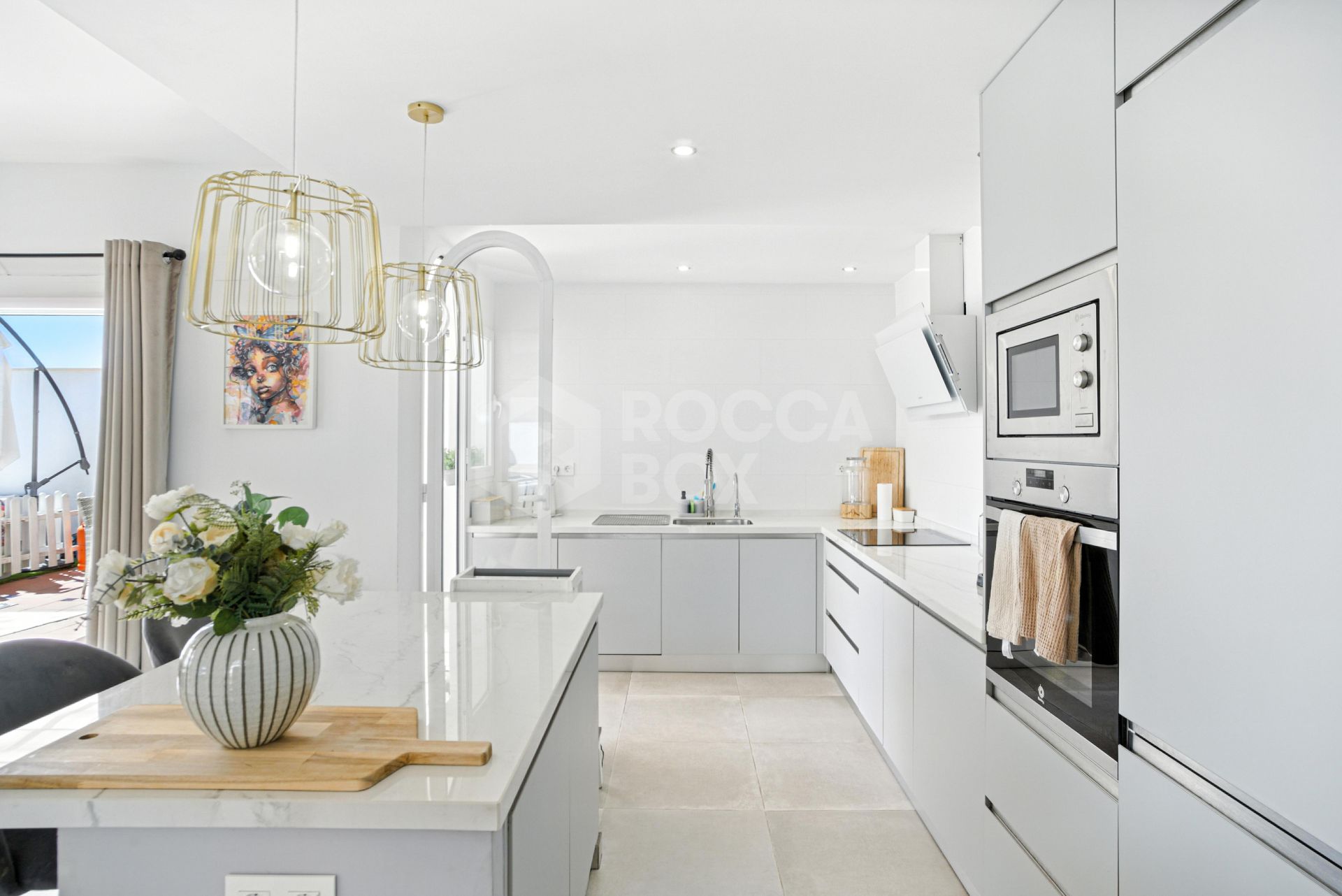 Stylish south west facing, three-bedroom semi detached townhouse located in Riviera del Sol