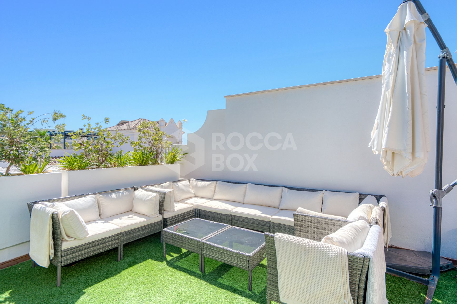 Stylish south west facing, three-bedroom semi detached townhouse located in Riviera del Sol