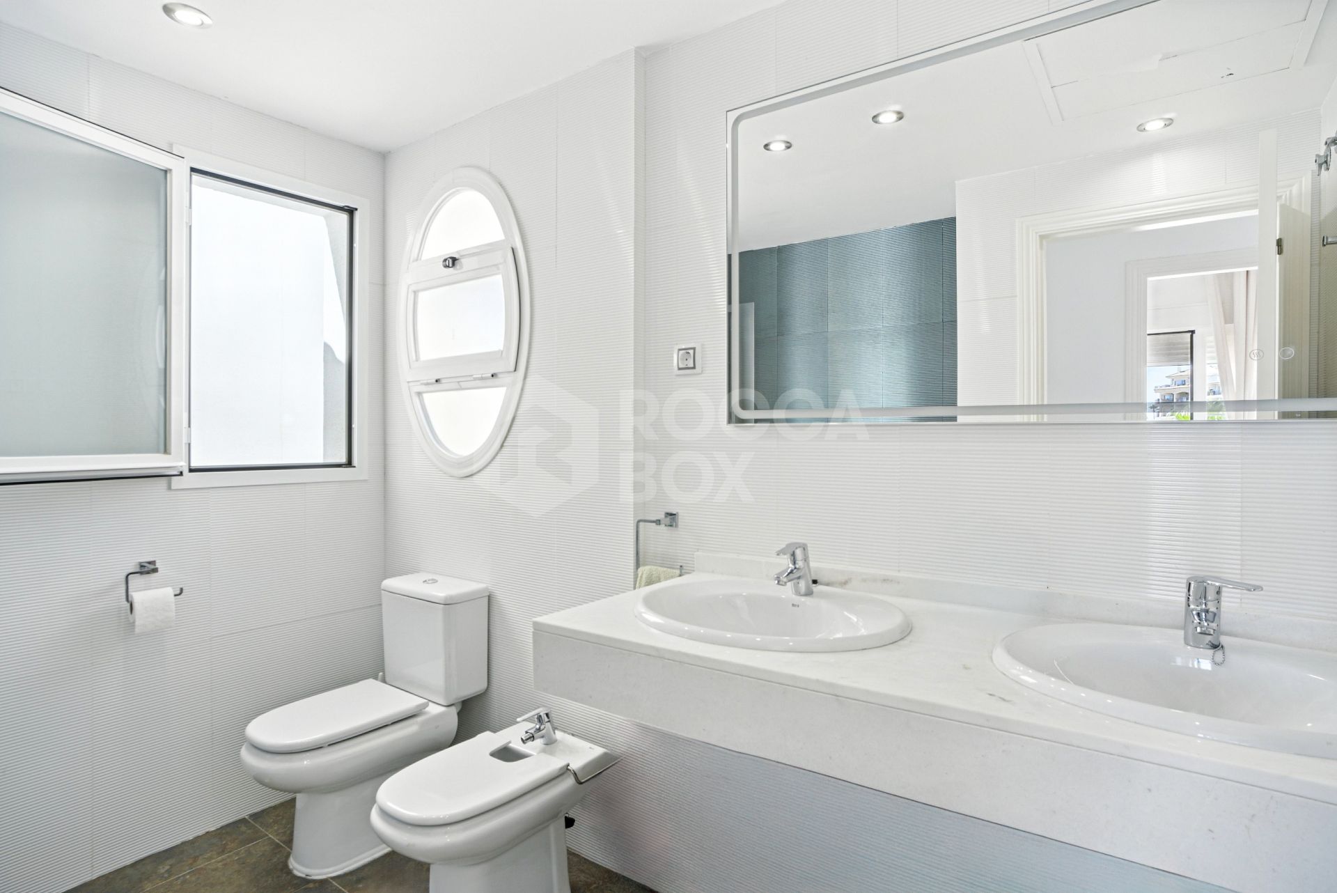 Stylish south west facing, three-bedroom semi detached townhouse located in Riviera del Sol
