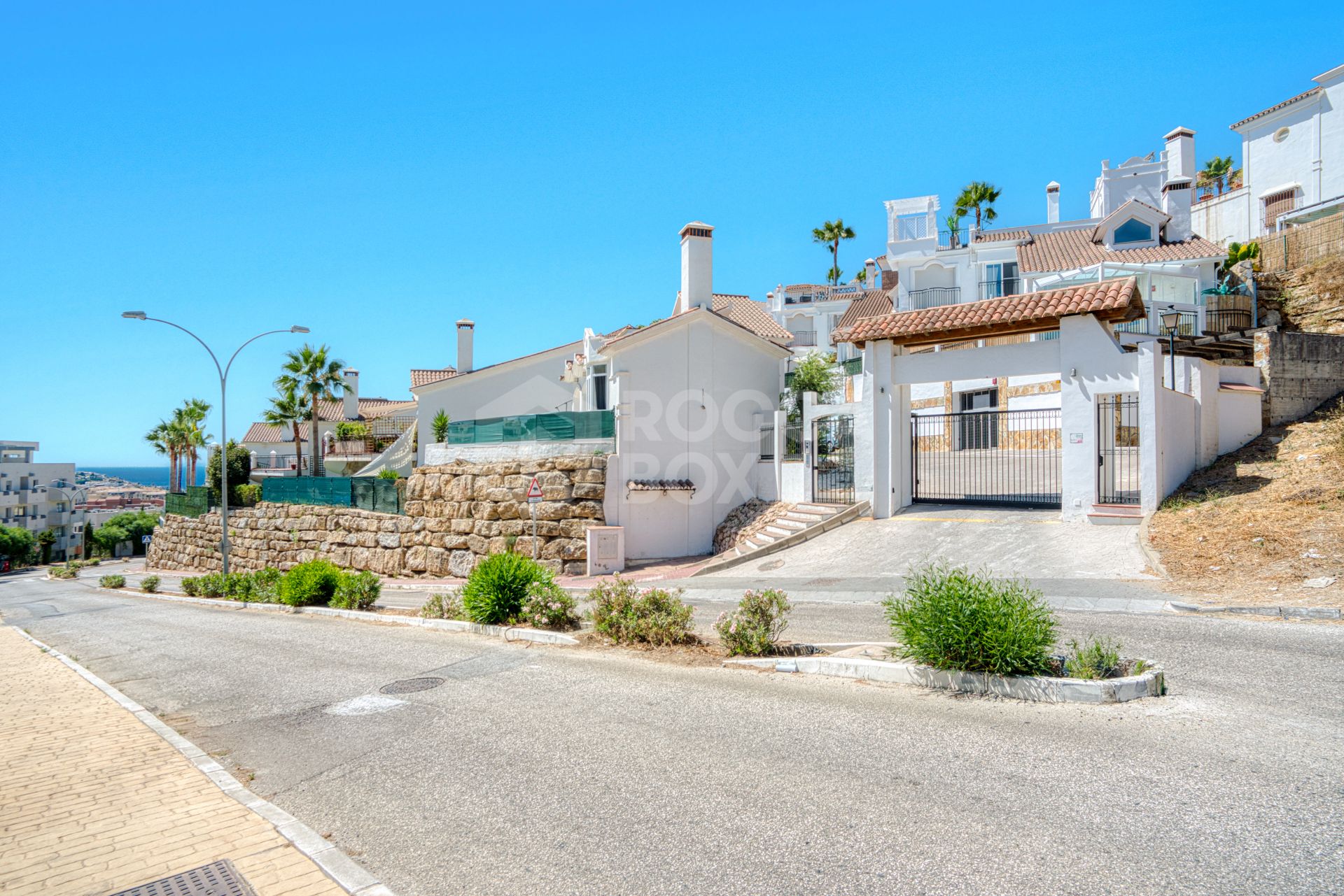 Stylish south west facing, three-bedroom semi detached townhouse located in Riviera del Sol