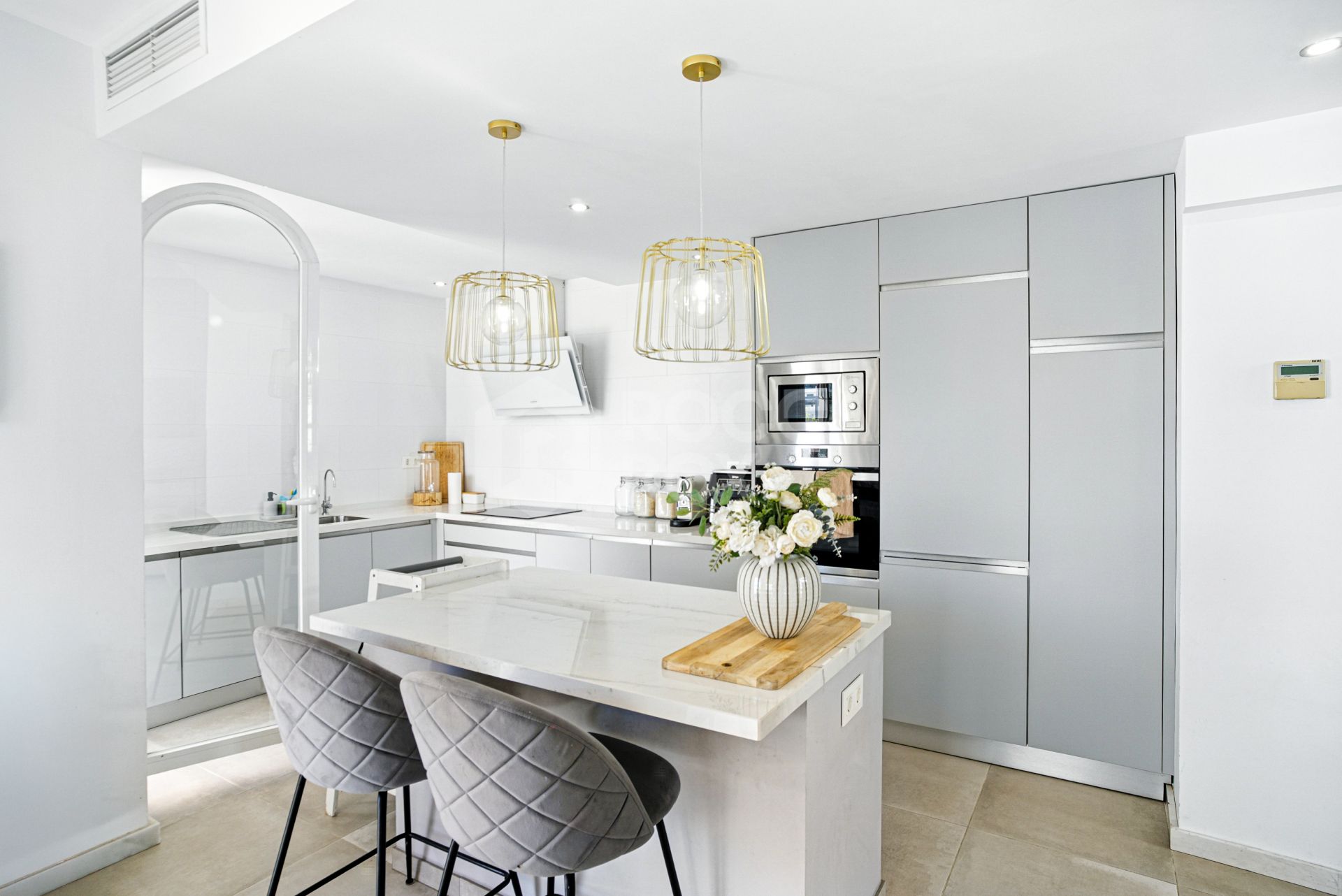 Stylish south west facing, three-bedroom semi detached townhouse located in Riviera del Sol