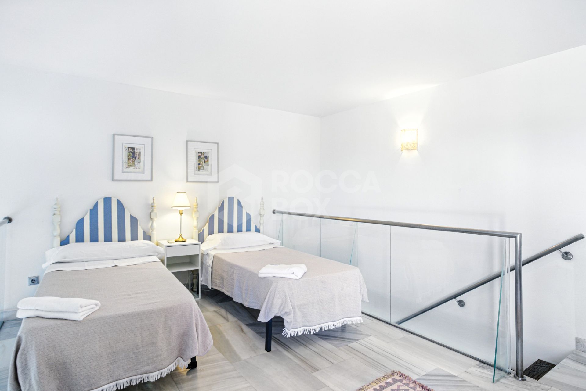 Charming west facing, three bedroom duplex penthouse located in the gated community Parque Botanico, Estepona