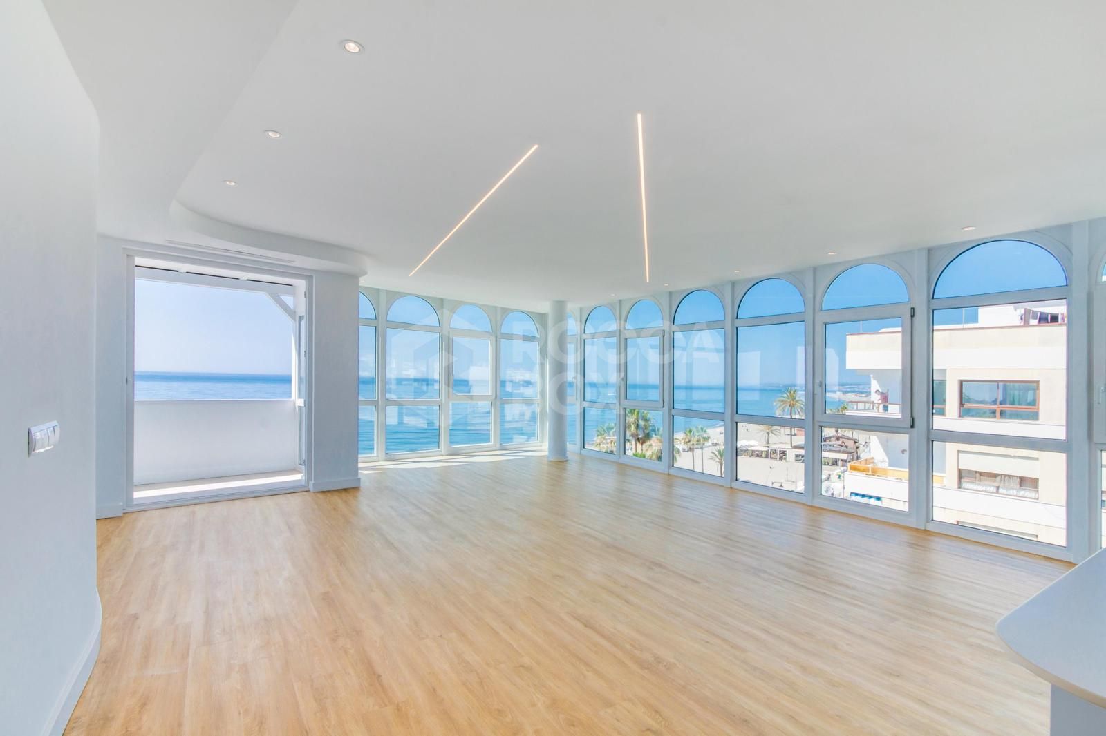 Stunning, south-facing fully renovated, three bedroom beachfront apartment in the heart of Estepona’s charming Old Town