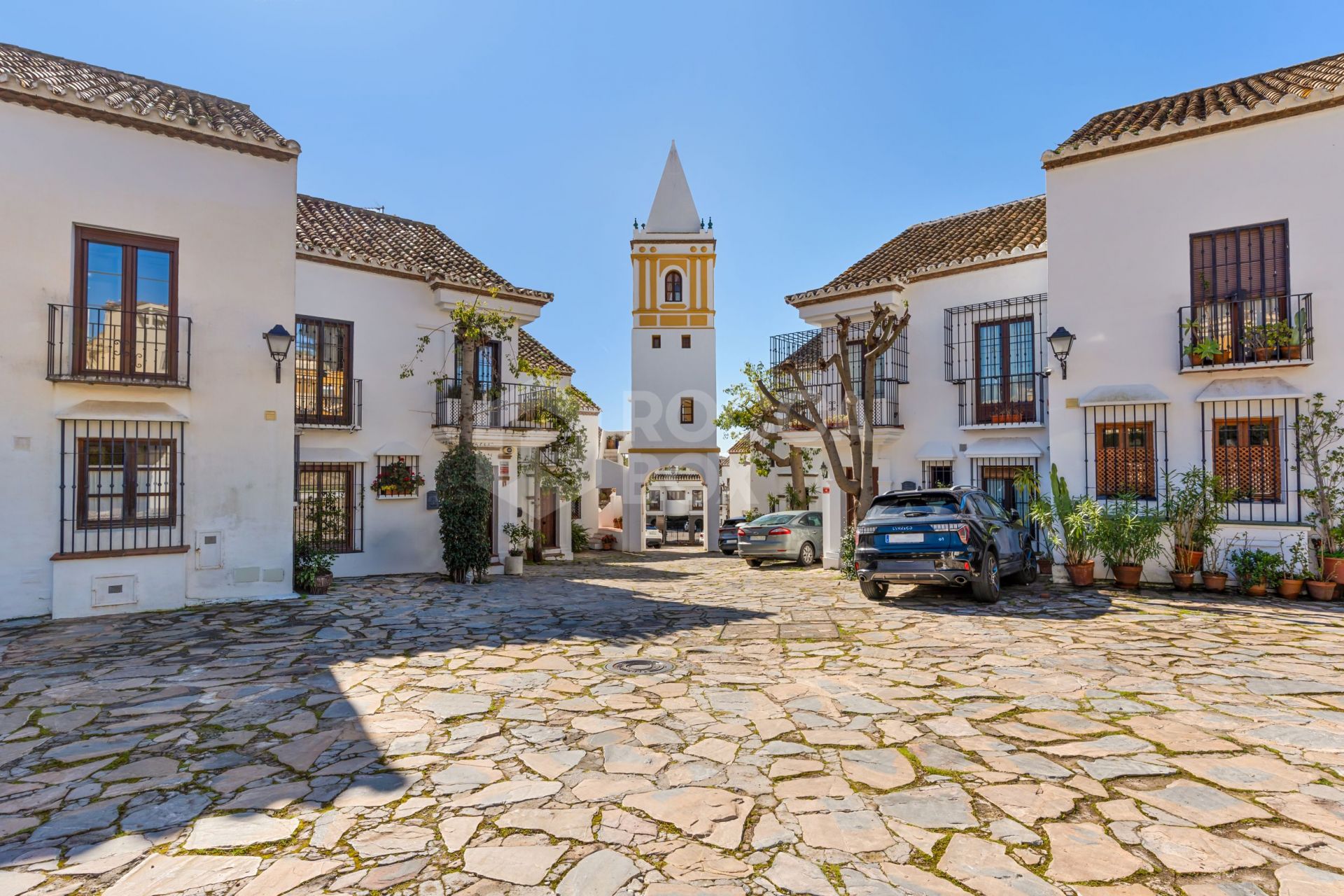 South-facing four-bedroom townhouse located in the gated community of Montepiedra , Nagueles within the Golden Mile, Marbella